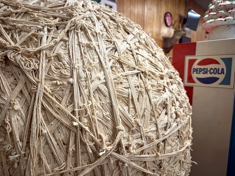 The ball of string was made by staff at Haussner’s restaurant, which closed in 1999. The ball heads to auction Nov. 22.