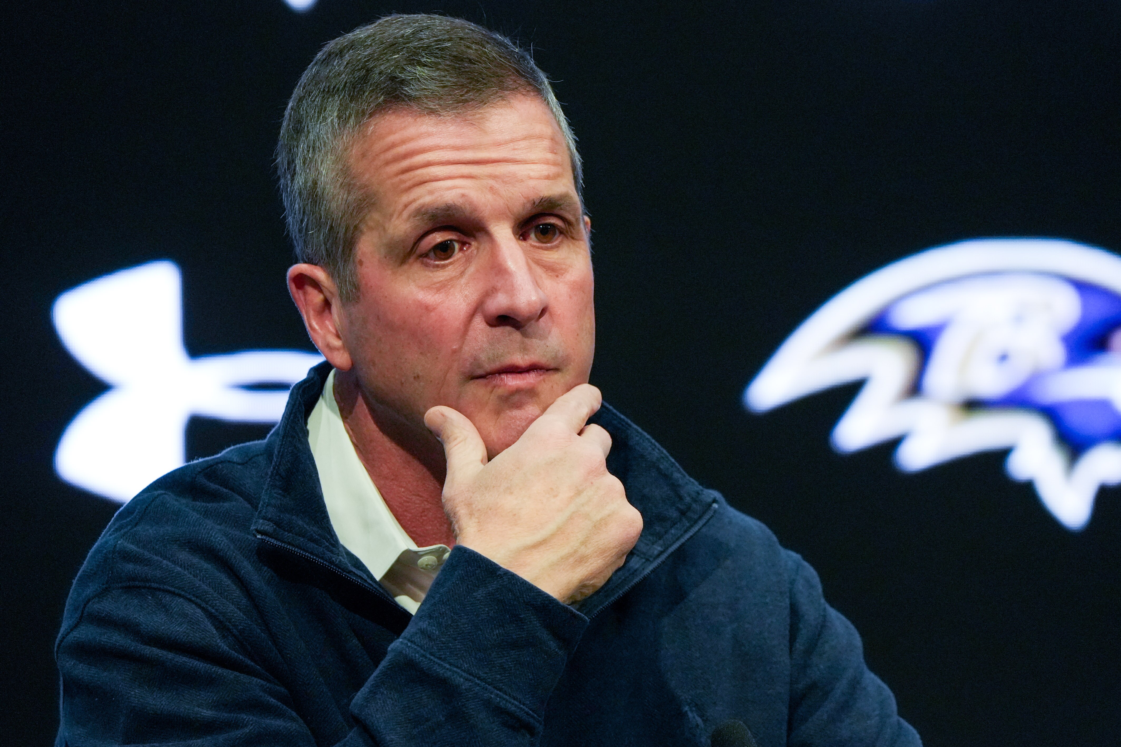 Ravens coach John Harbaugh takes questions from reporters during the team's end-of-year news conference at the Under Armour Performance Center in Owings Mills on Friday.