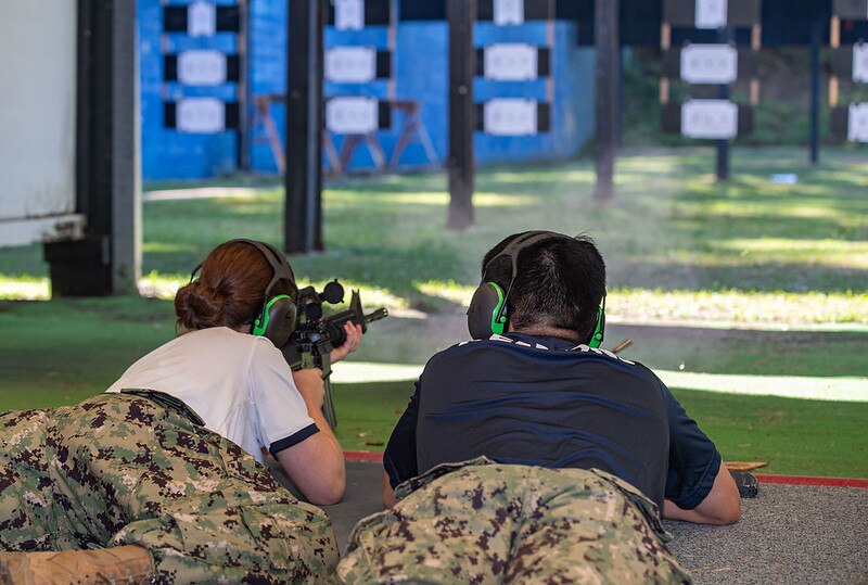 ANNAPOLIS, Md. (July 02, 2024) Midshipmen 4th Class, or plebes, of 3rd and 4th company from the United States Naval Academy Class of 2028 participate in pistol and rifle training during Plebe Summer, a demanding indoctrination period intended to transition the candidates from civilian to military life. As the undergraduate college of our country's naval service, the Naval Academy prepares young men and women to become professional officers of competence, character, and compassion in the U.S. Navy and Marine Corps. (U.S. Navy photo by Kenneth D. Aston Jr.)
