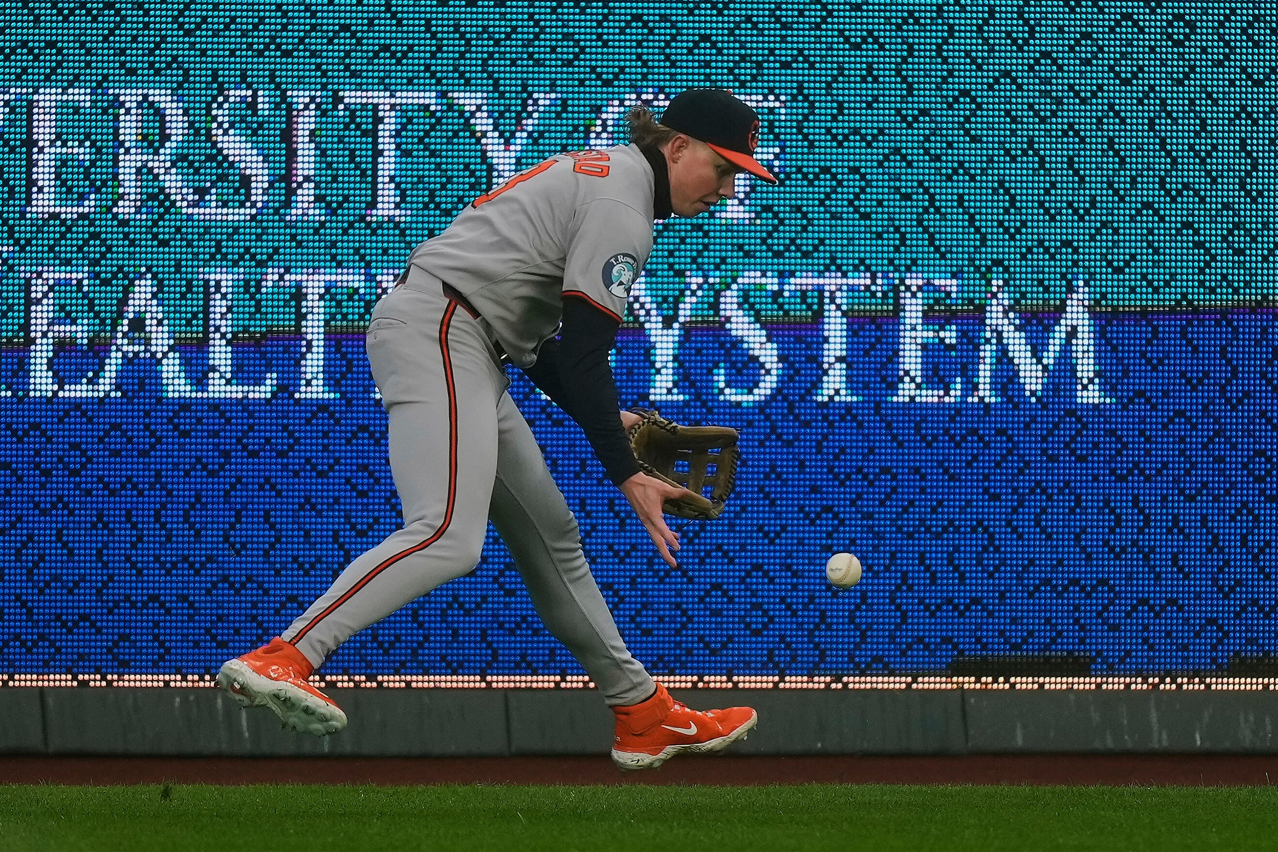 Baltimore Orioles left fielder Heston Kjerstad fields an RBI double hit by Kansas City Royals' Salvador Perez during the first inning.
