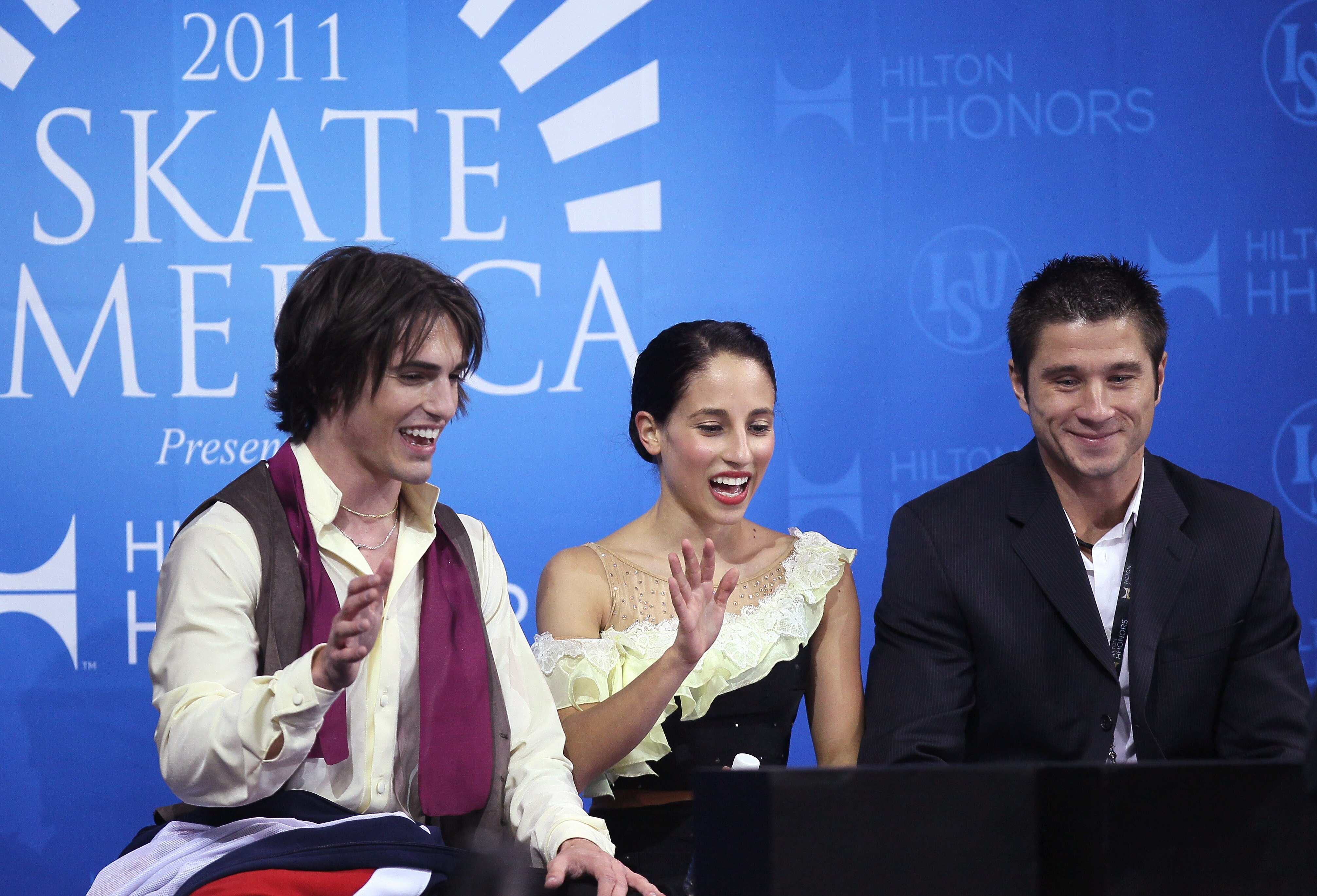 ONTARIO, CA - OCTOBER 22:  Coach Sasha Kirsanov, right, with Isabella Cannuscio and Ian Lorello after their performance in the Ice Dance Free Dance during Hilton HHonors Skate America at Citizens Business Bank Arena on October 22, 2011 in Ontario, California.