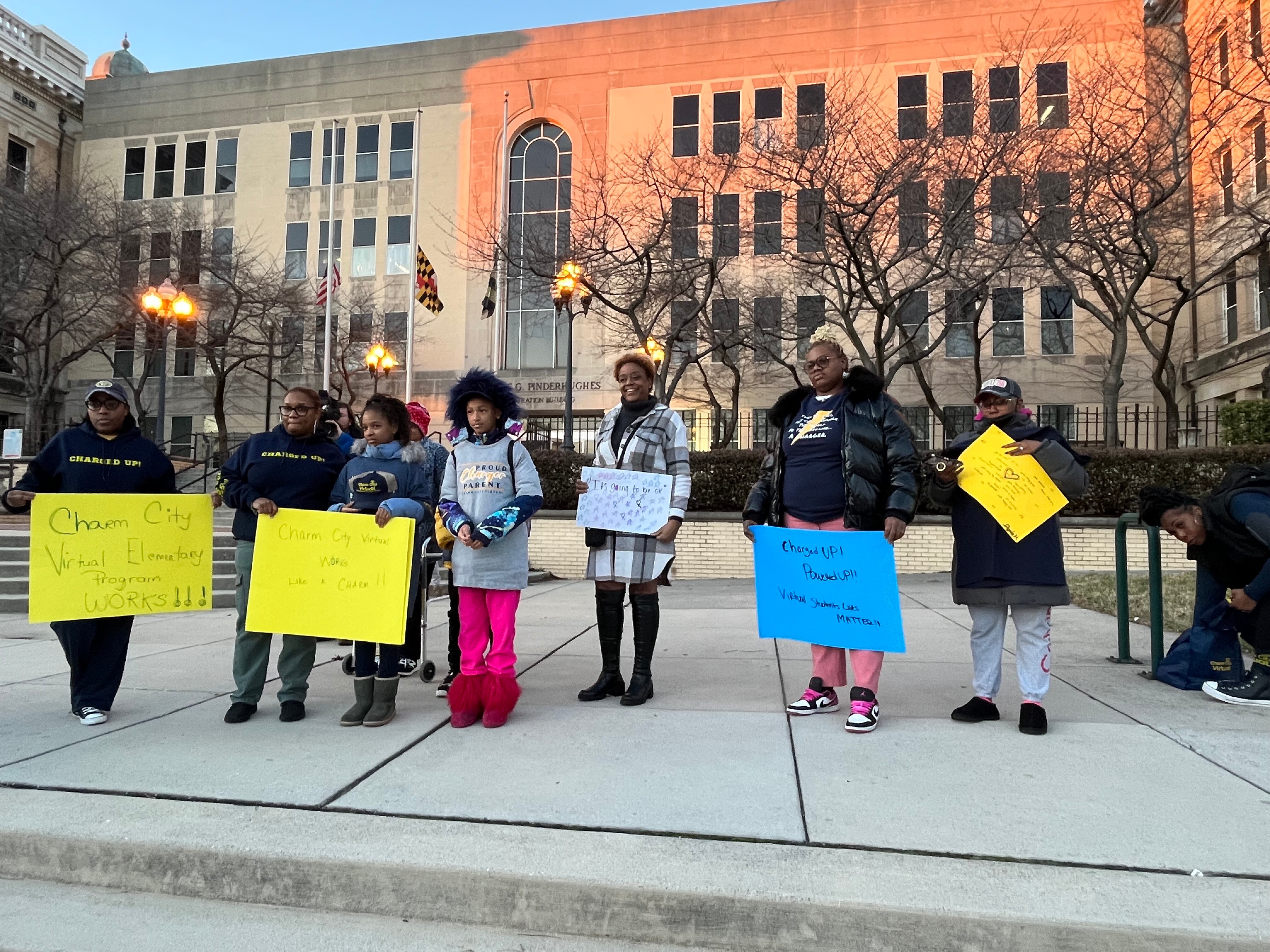 Charm City Virtual parents and students rallied outside the Baltimore City Public Schools Building on North Avenue on Jan. 11, 2023, to protest the proposed elimination of the program for elementary students.