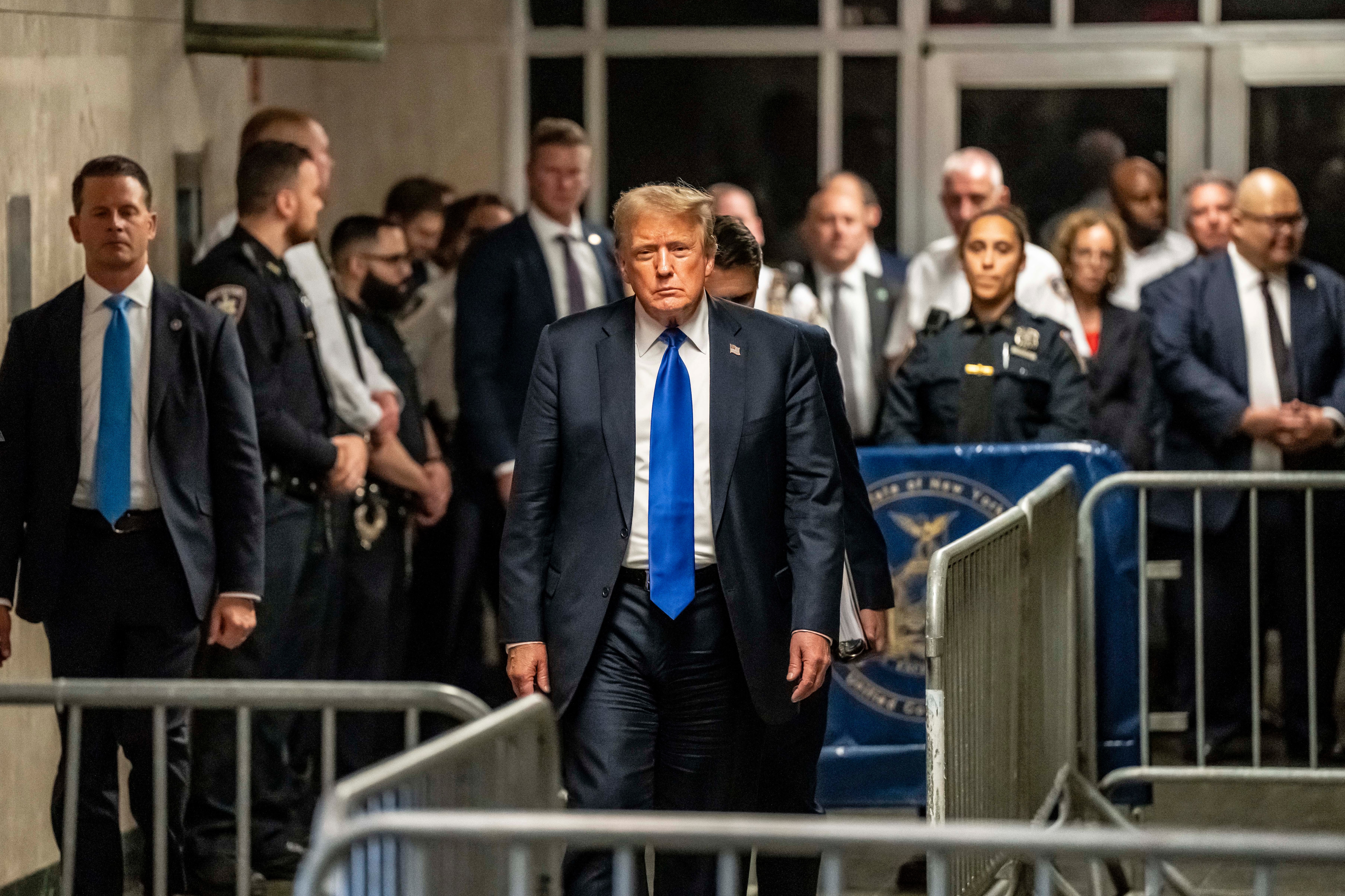 NEW YORK, NEW YORK - MAY 30: Former President Donald Trump and his attorney Todd Blanche exit the courthouse and speak to media after Trump was found guilty following his hush money trial at Manhattan Criminal Court on May 30, 2024 in New York City. The former president was found guilty on all 34 felony counts of falsifying business records in the first of his criminal cases to go to trial. Trump has now become the first former U.S. president to be convicted of felony crimes.