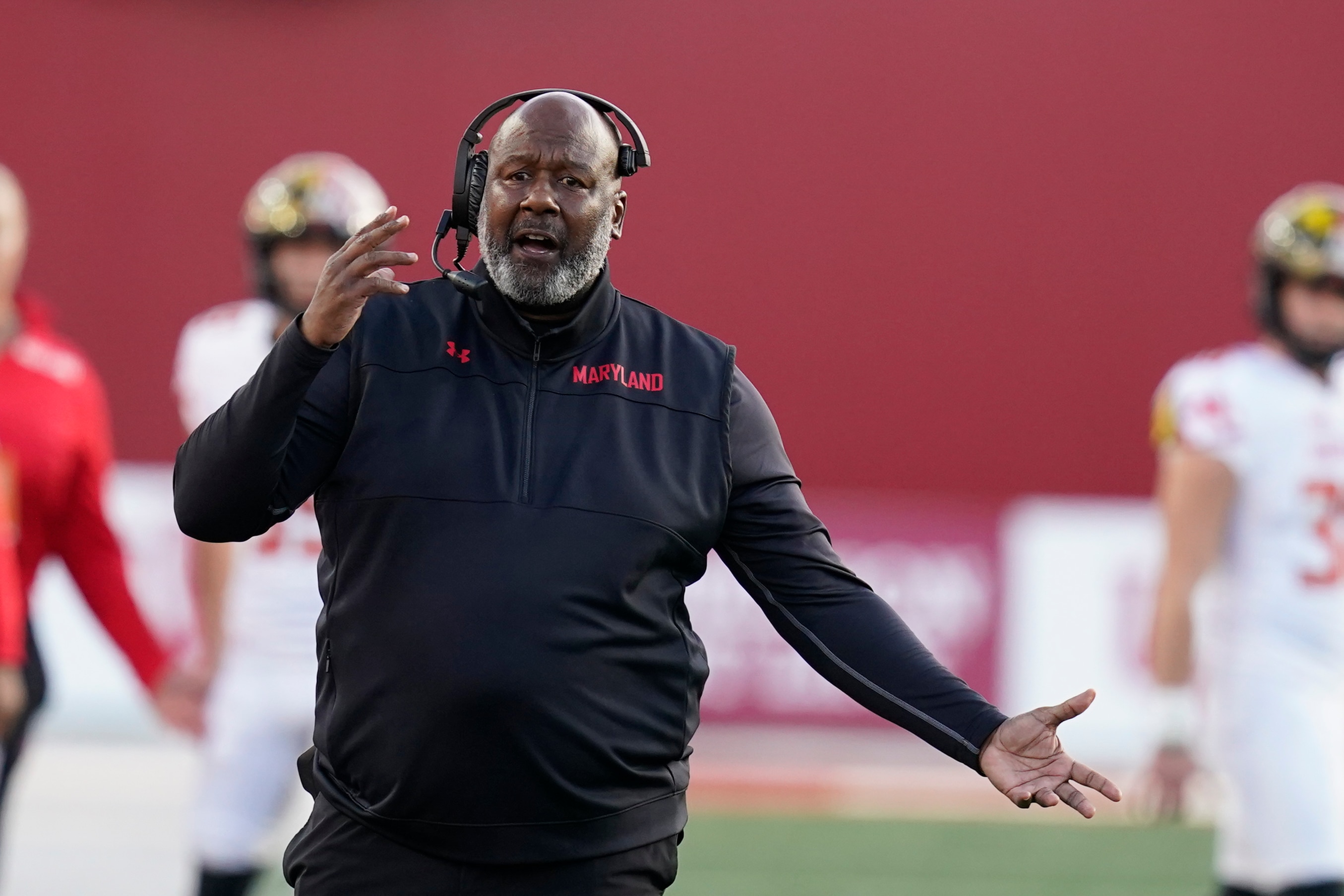 Maryland head coach Mike Locksley questions a call during the second half of an NCAA college football game against Indiana, Saturday, Oct. 15, 2022, in Bloomington, Ind