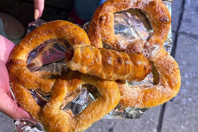 Canton Pretzel Store hands pretzels wrapped in foil directly to people passing by on O'Donnell Street.