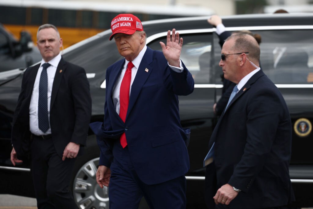 President Donald Trump waves to NASCAR fans on the grid prior to the NASCAR Cup Series Daytona 500 on February 16 in Daytona Beach, Florida.