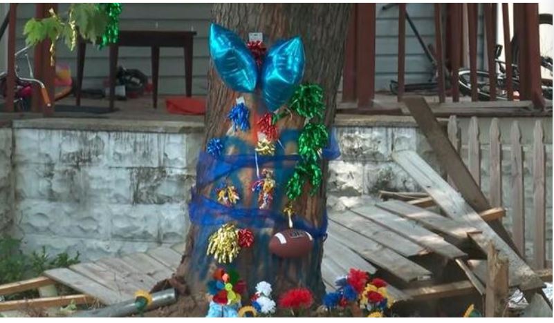 A memorial on a tree remembers Anthony Hilton III, an 18-year-old from Glen Burnie who died in a car crash in Brooklyn Park early on June 26, 2024.