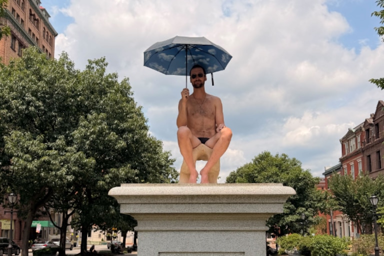 Hamb, the performance artist arrested for nude installment on a pedestal in the Inner Harbor, resurfaces in scantily clad pedestal pose in Mount Vernon on Sunday, July 26, 2026.