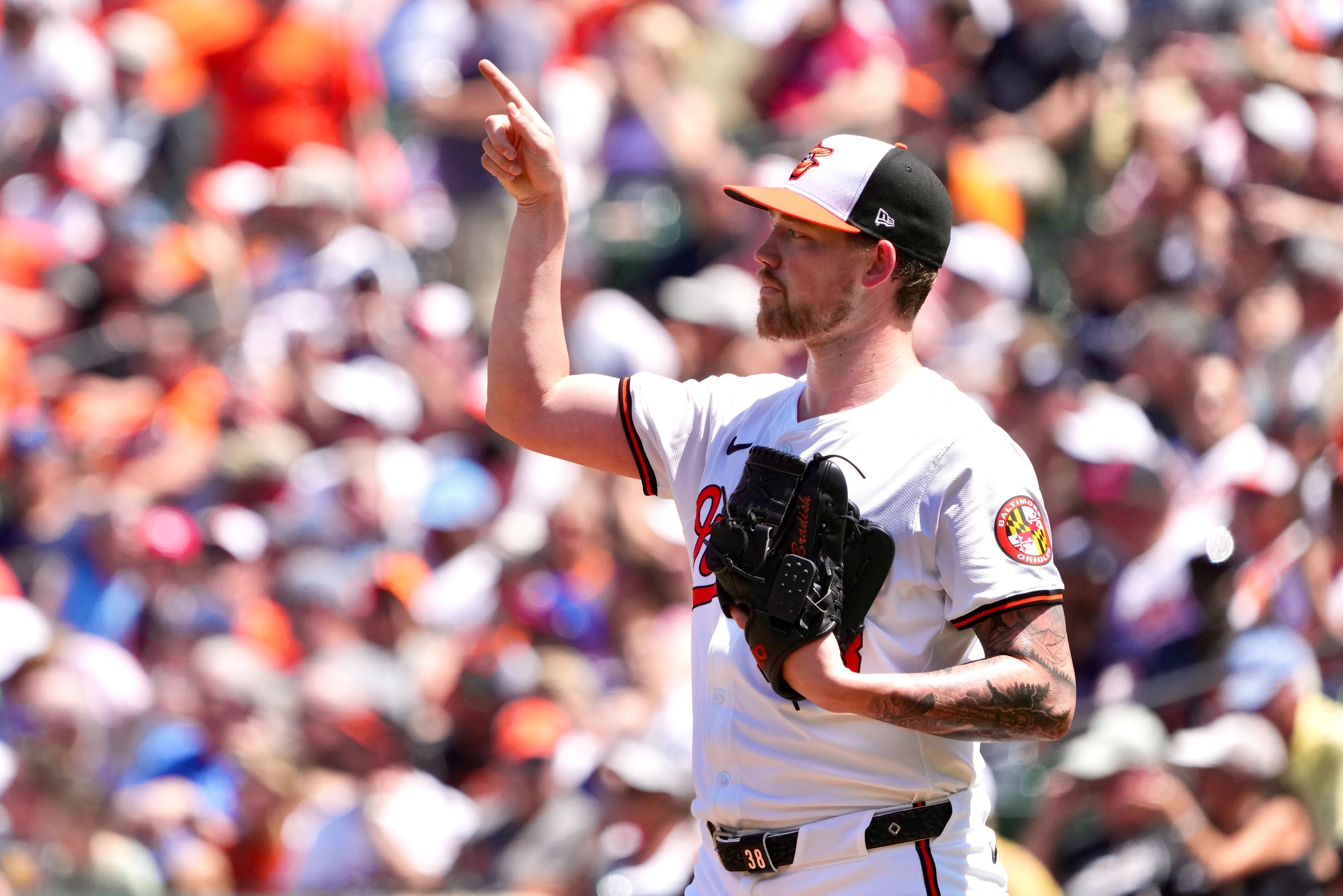 Kyle Bradish pitched 4 2/3 innings in his season debut after an elbow injury as the Orioles beat the New York Yankees on Thursday at Camden Yards.