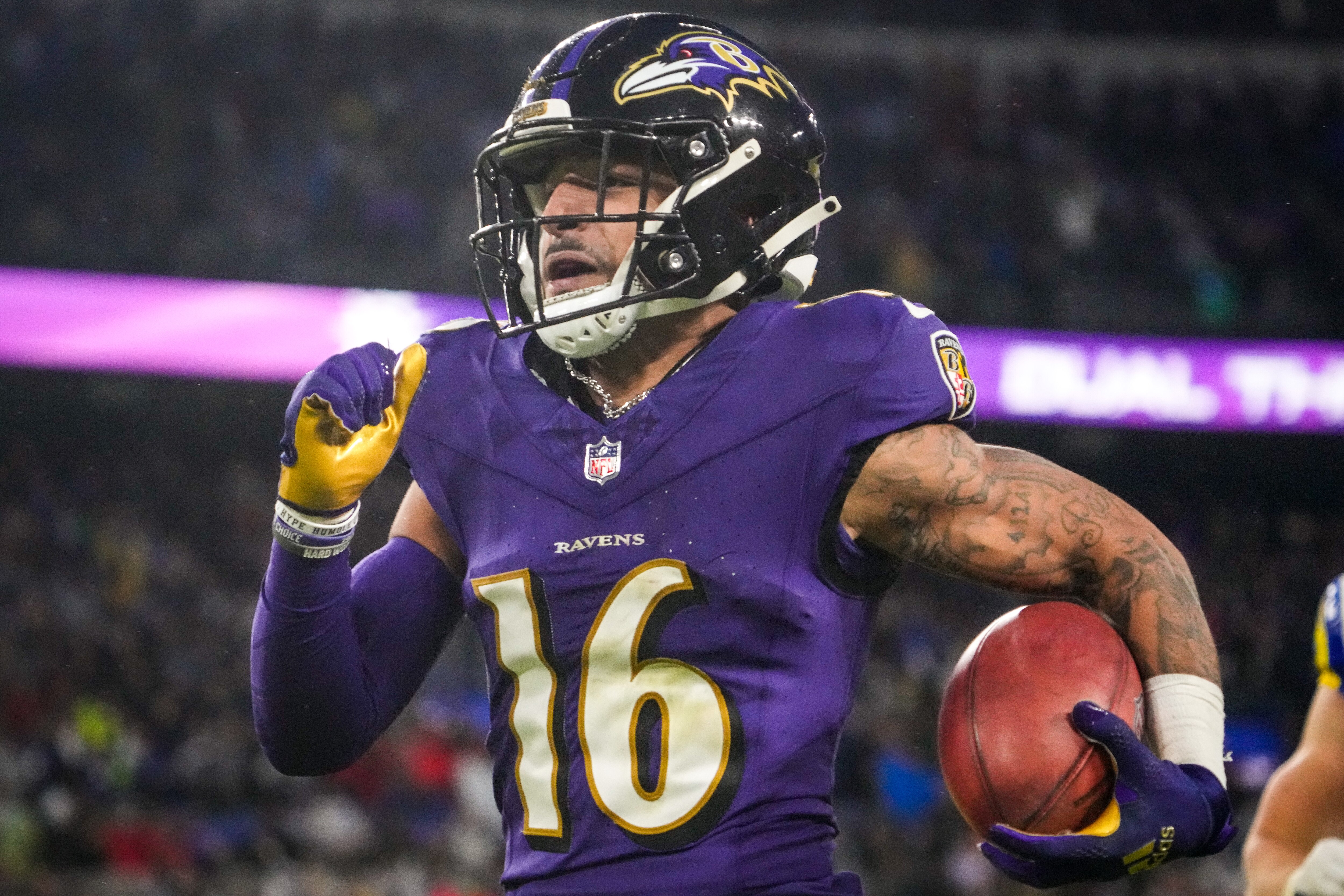 Ravens wide receiver Tylan Wallace returns a punt 76 yards for the winning touchdown Sunday.