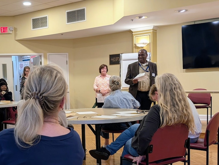 Markus Moore, Annapolis transportation director, explains some of the proposals recommended by a parking solutions study group to a Sept. 29, 2026 Annapolis Parking Alliance meeting.