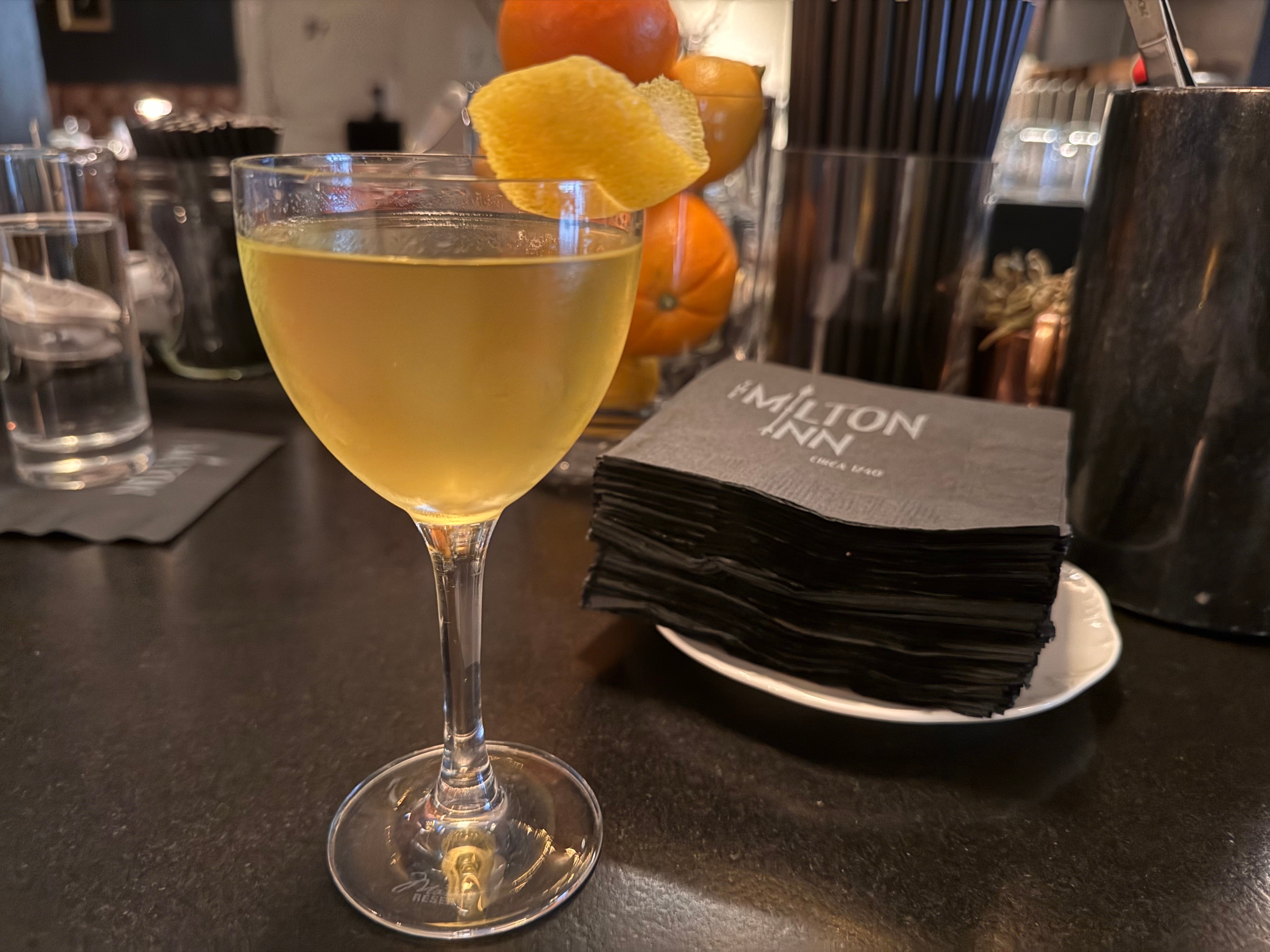 The Song of Sufax, a Milton Inn drink staple, consists of "very cold" vodka, vermouth and orange bitters.