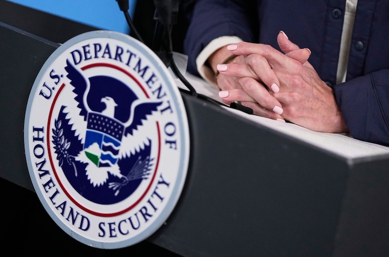 U.S. Department of Homeland Security seal seen on a podium