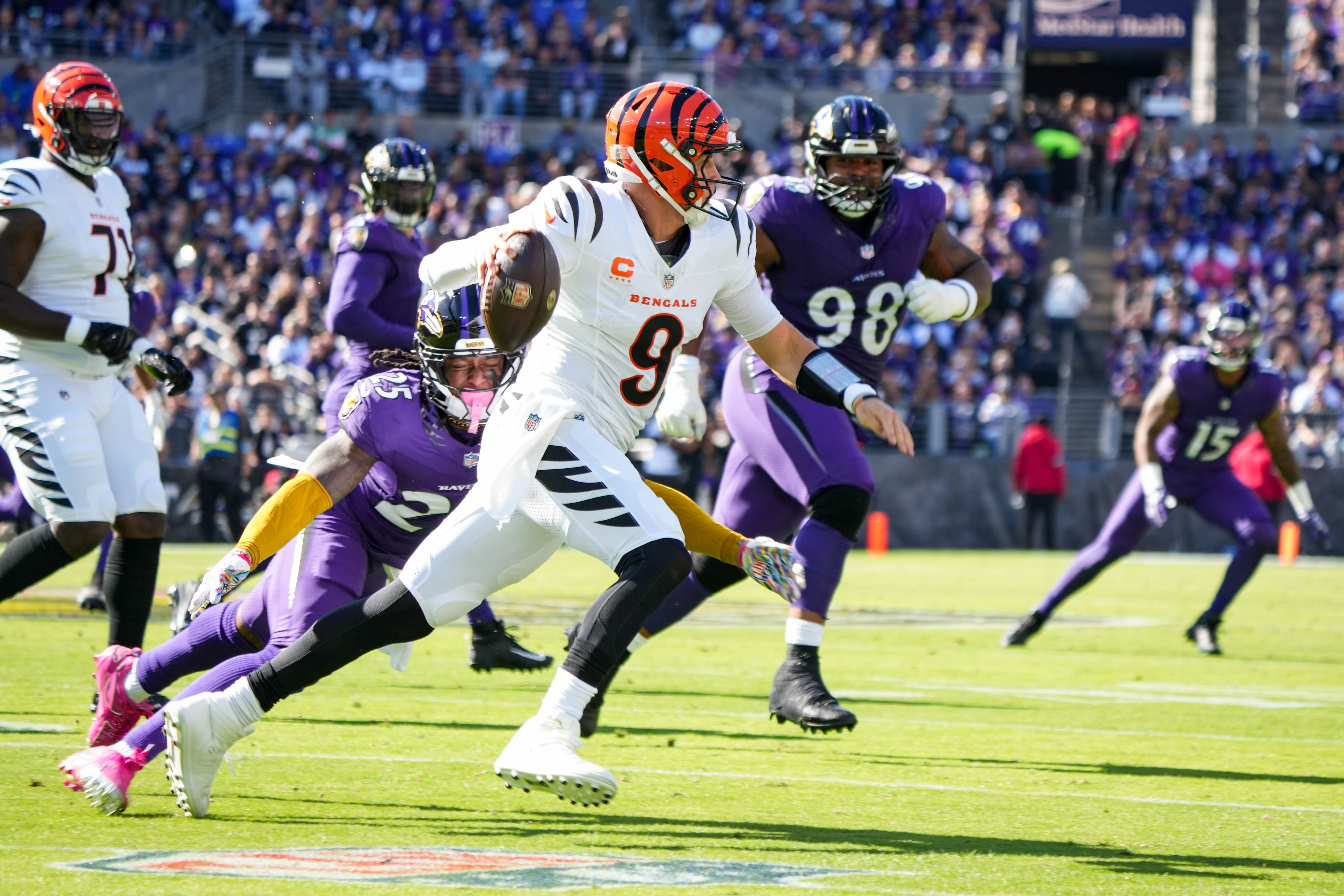 Ravens cornerback K'von Wallace pressures Bengals quarterback Joe Burrow in the first quarter Sunday during Cincinnati’s 35-13 victory.