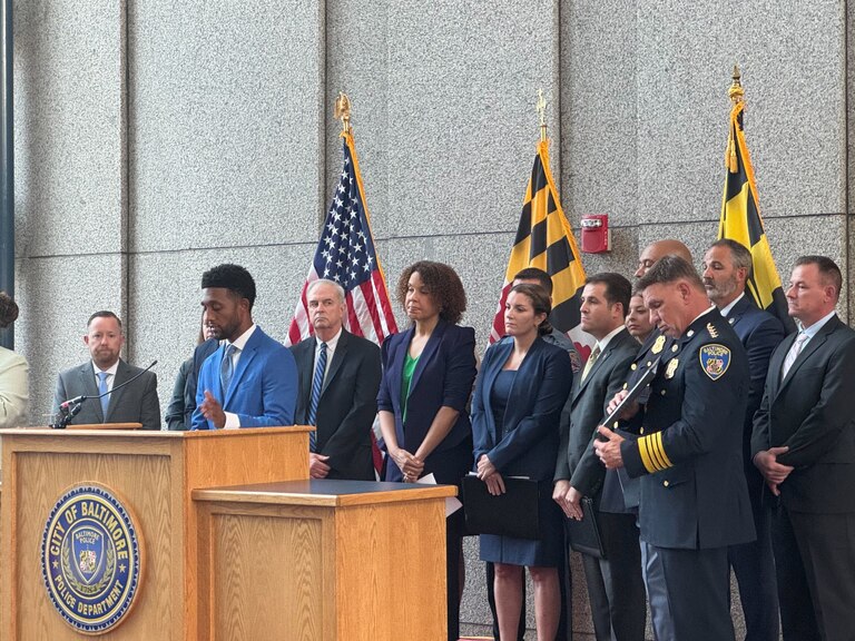 Baltimore Mayor Brandon Scott, joined by police and prosecutors from the Maryland Attorney General's Office, announced the arrest of 11 people charged with more than 80 crimes around the Baltimore Region, July 10, 2024.