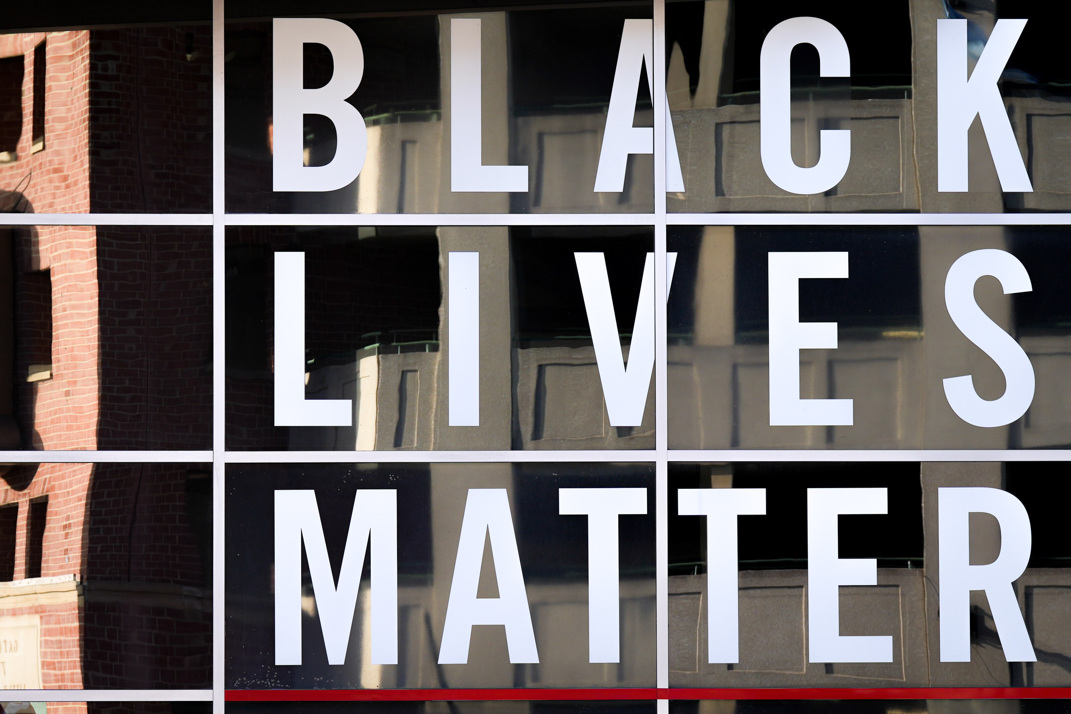 “Black Lives Matter” is displayed in the windows of the Reginald F. Lewis Museum.