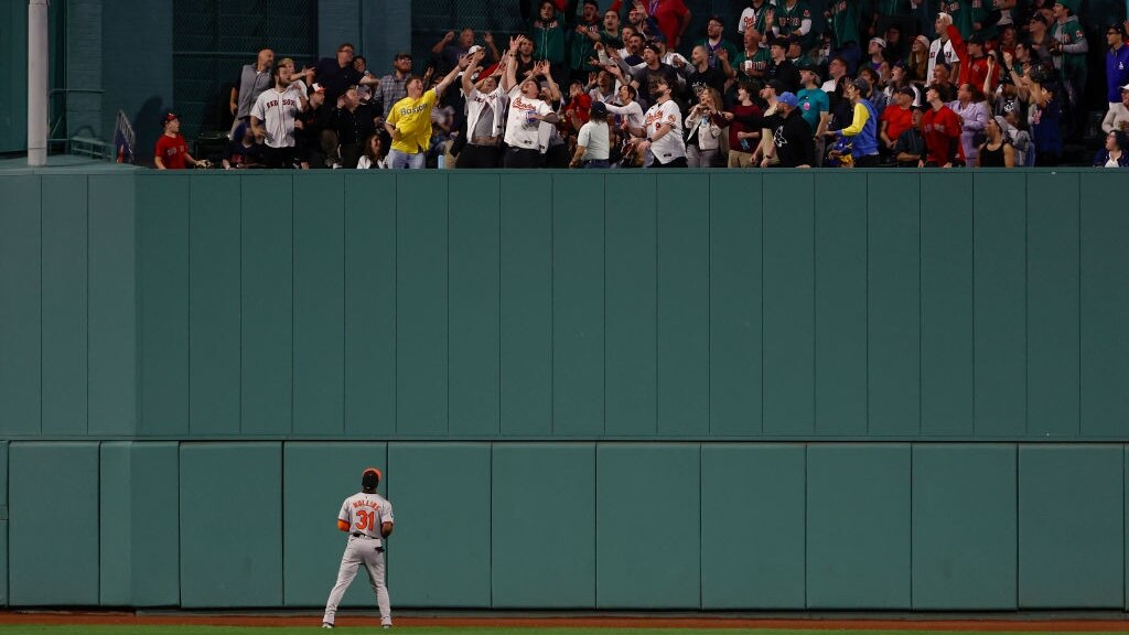 BOSTON, MA - SEPTEMBER 9: Cedric Mullins #31 of the Baltimore Orioles watches as a ball hit by Rob Refsnyder #30 of the Boston Red Sox goes into the center field bleachers for a two-run home run during the third inning at Fenway Park on September 9, 2024 in Boston, Massachusetts. (Photo By Winslow Townson/Getty Images)