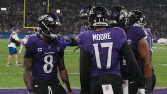 Baltimore Ravens wide receiver Chris Moore (17) celebrates with quarterback Lamar Jackson (8) after a touchdown during the second half of an NFL football game against the Dallas Cowboys in Rio de Janeiro, Sunday, Sept. 27, 2026. (AP Photo/Fernando Llano)