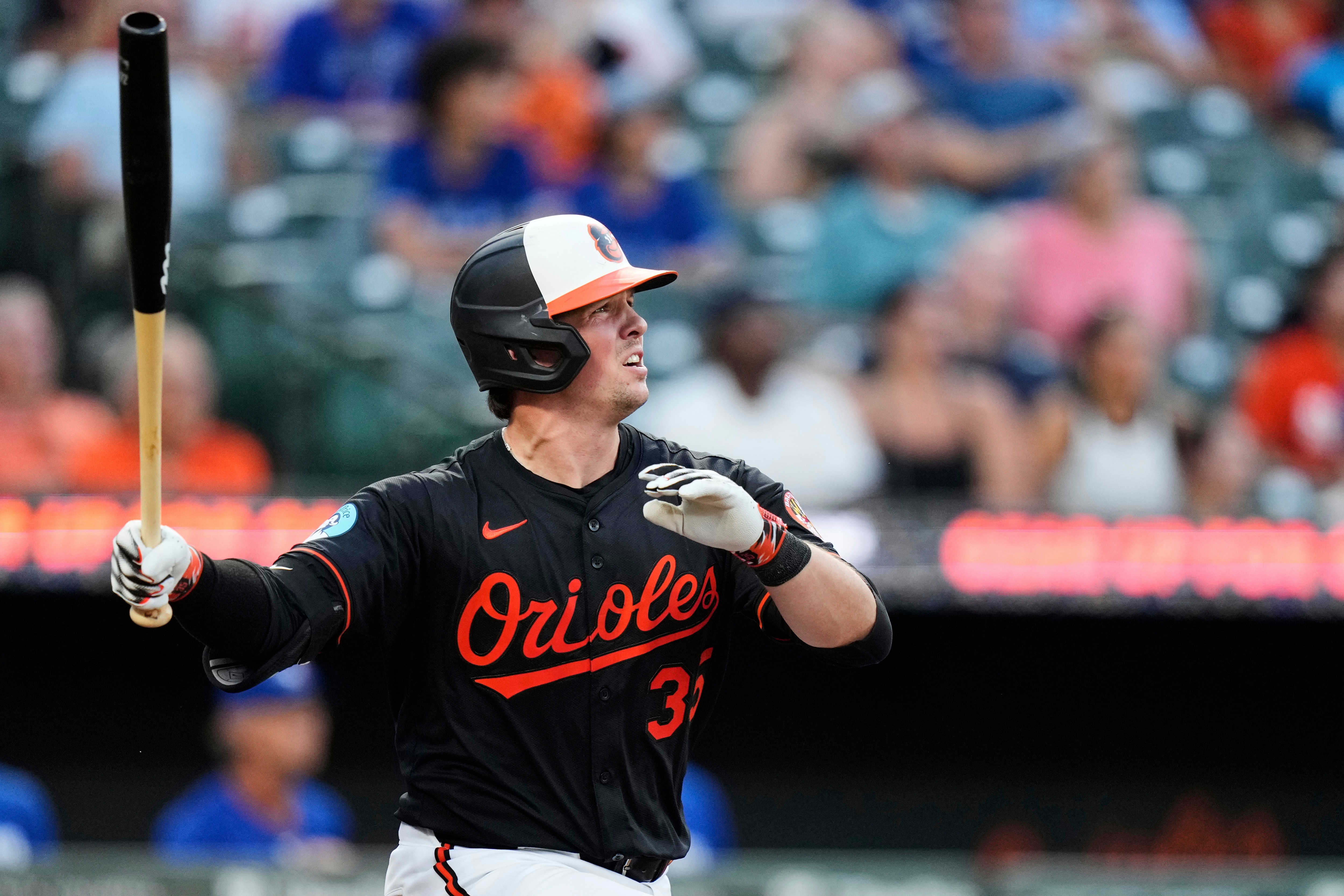 Adley Rutschman watches his two-run double during the third inning against the Toronto Blue Jays.
