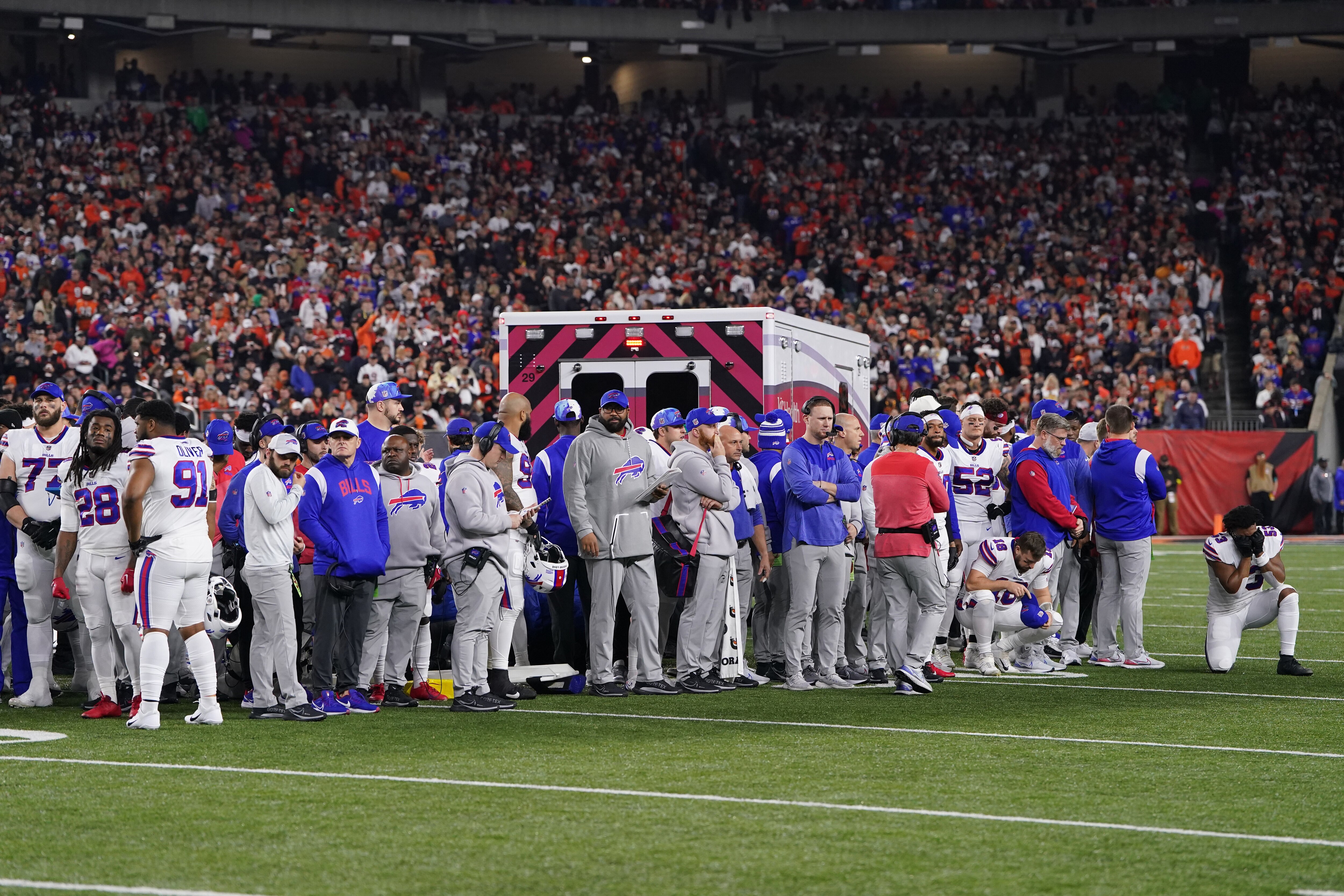 CINCINNATI, OHIO - Buffalo Bills players look on after teammate Damar Hamlin collapsed on the field after making a tackle against the Cincinnati Bengals during the first quarter at Paycor Stadium on January 02, 2023 in Cincinnati, Ohio.