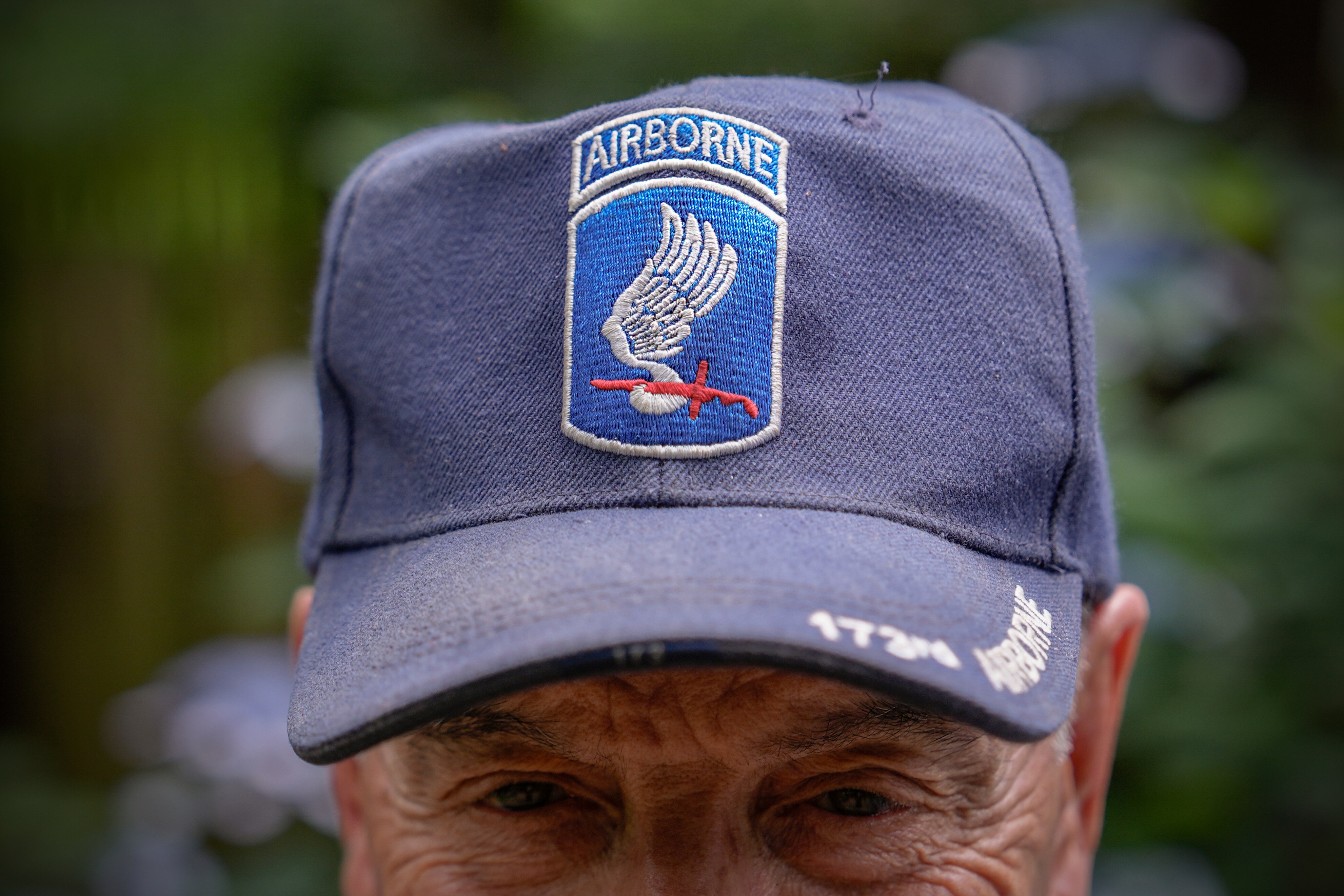 James McDonough wears a 173rd Airborne Brigade hat while posing for a portrait, Tuesday, June 10, 2025, in Crofton, Md. (AP Photo/Julia Demaree Nikhinson)