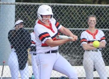 Rising Sun's Cadence Williams takes a swing during Friday's UCBAC Chesapeake softball match against Patterson Mill. Williams had 2 hits and pitched a complete game 6-hitter as the fifth-ranked Tigers gained sole possession of first with a 5-0 victory over the No. 11 Huskies in Cecil County.