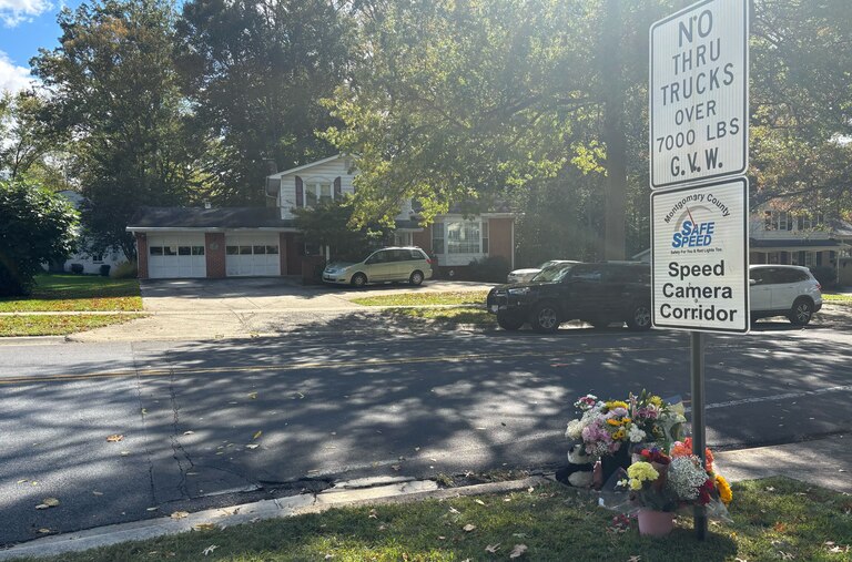 Items left at a Rockville intersection to honor Summer Lim, an 11-year-old girl killed in a collision with a school bus there last week.
