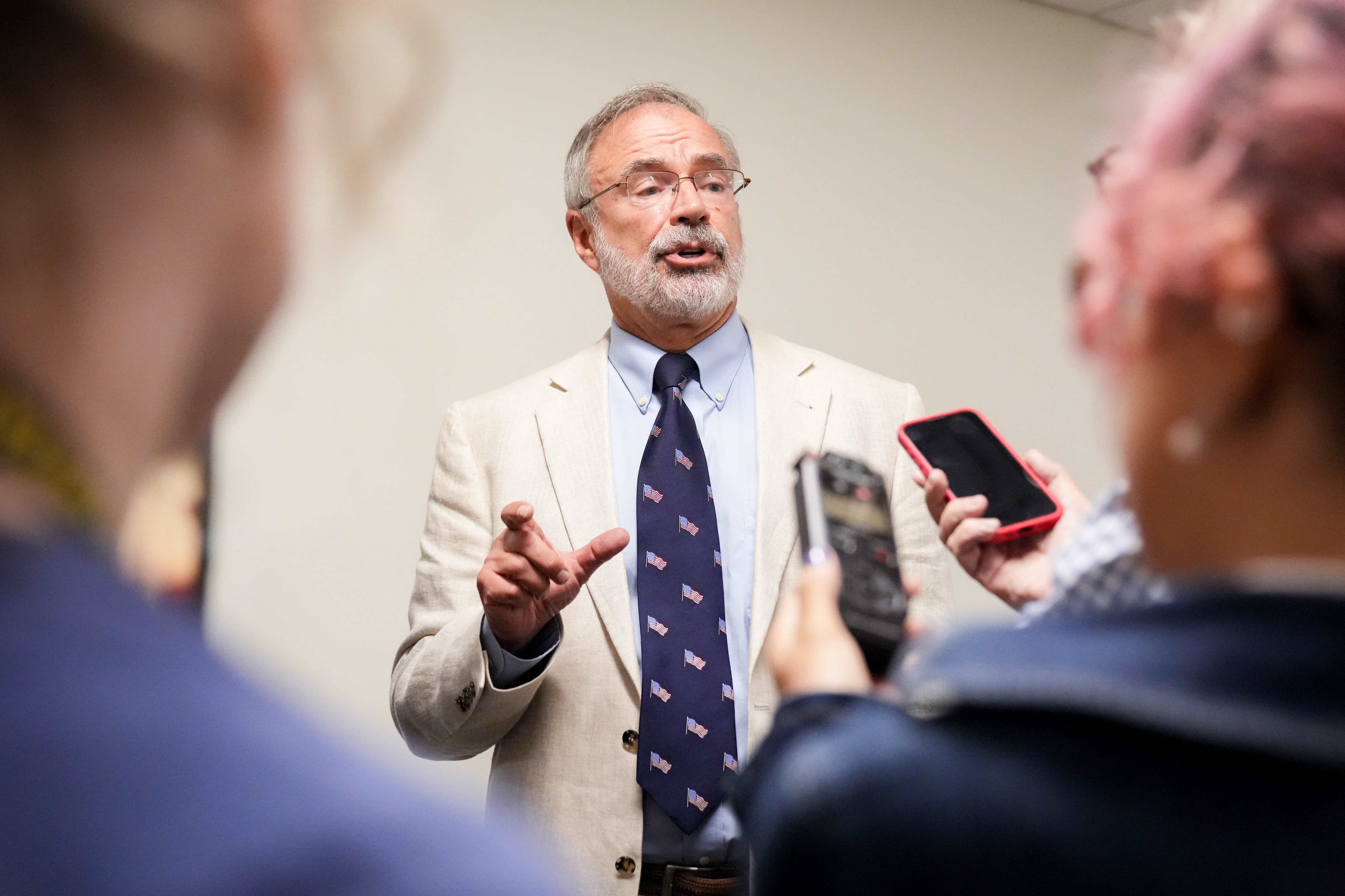 U.S. Rep. Andy Harris takes questions from reporters following a League of Women Voters forum at the Chesapeake Grove Intergenerational Center in Cambridge this month.