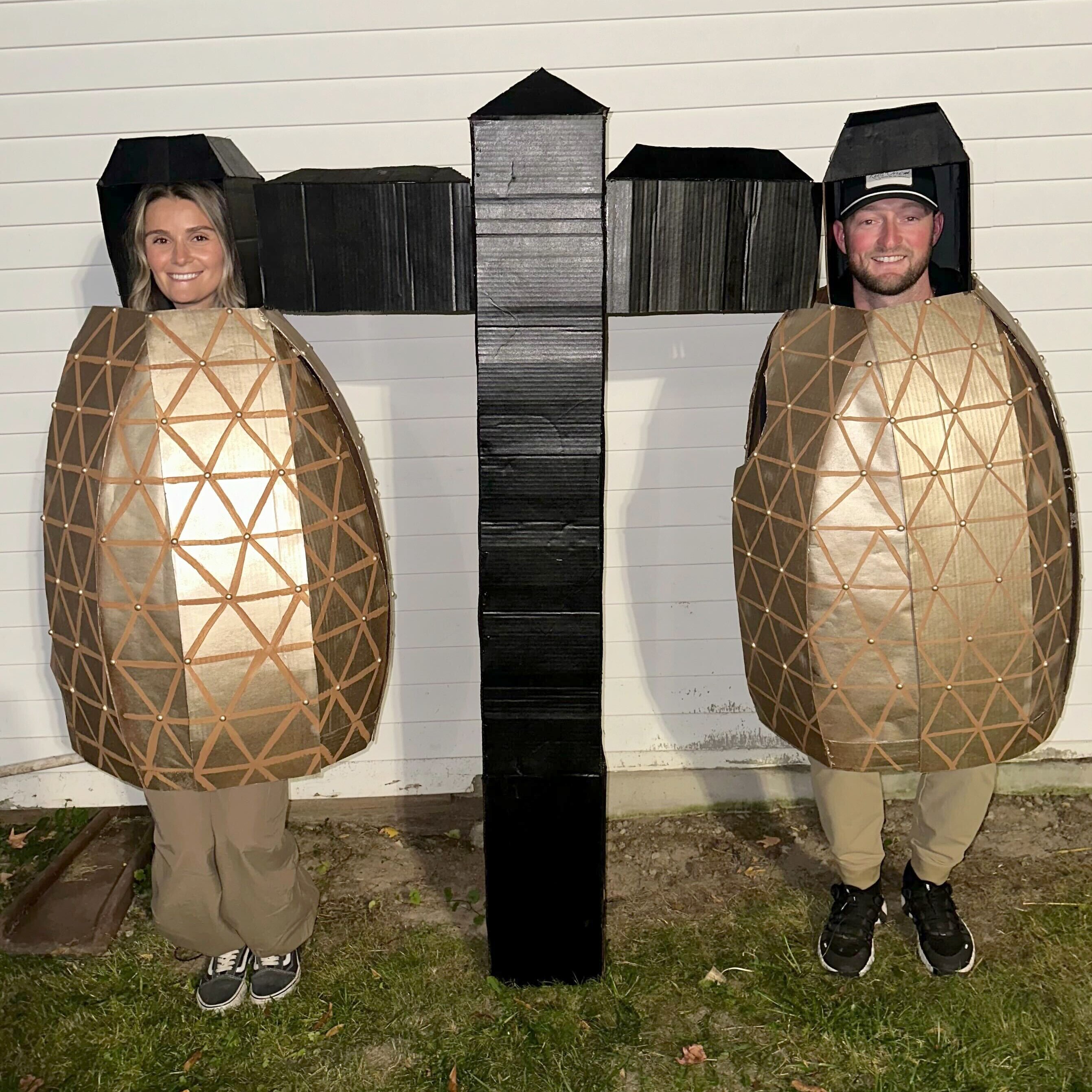 Brandon Hartman and his girlfriend Erisa Qirici in their handmade Halloween costume of the Back River Wastewater Treatment Plant in Dundalk.