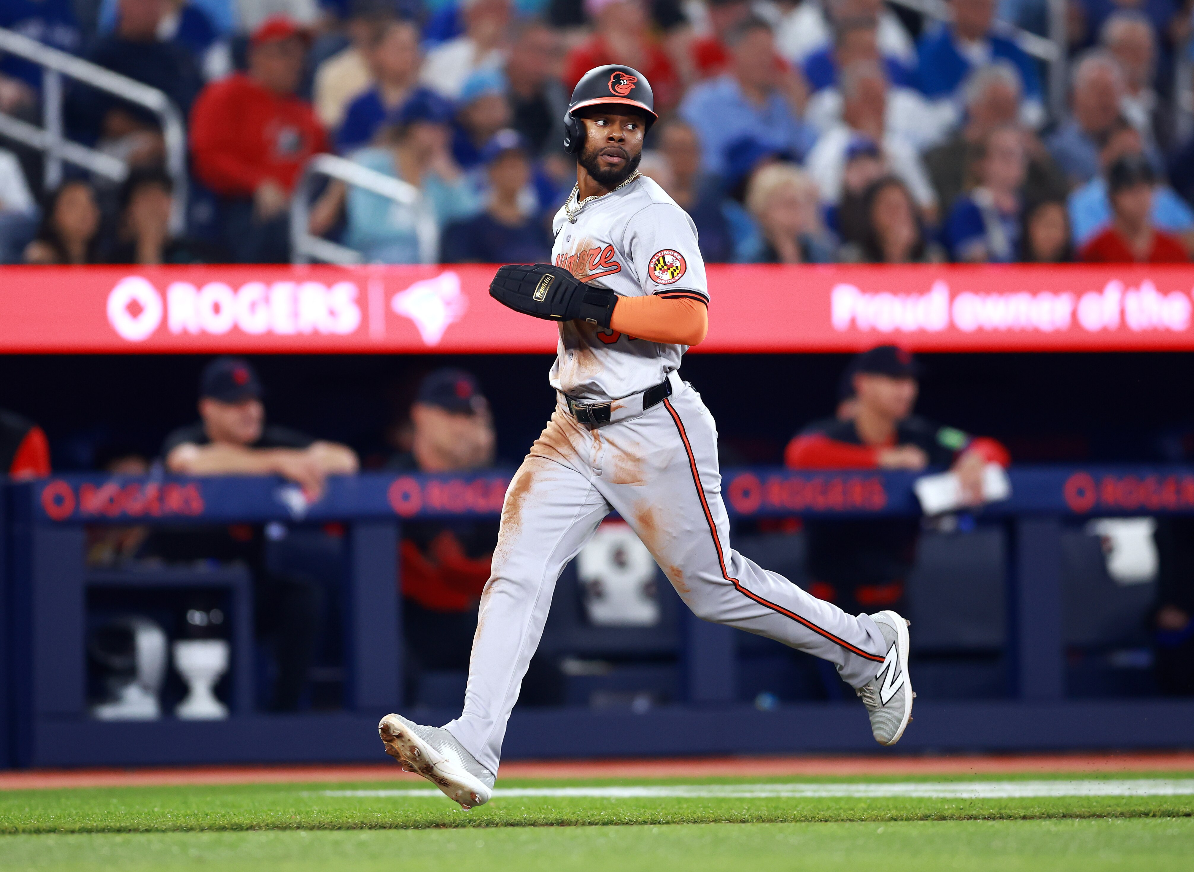 Cedric Mullins scores a second-inning run Wednesday night as the Orioles lost 3-2 to the Blue Jays in Toronto.