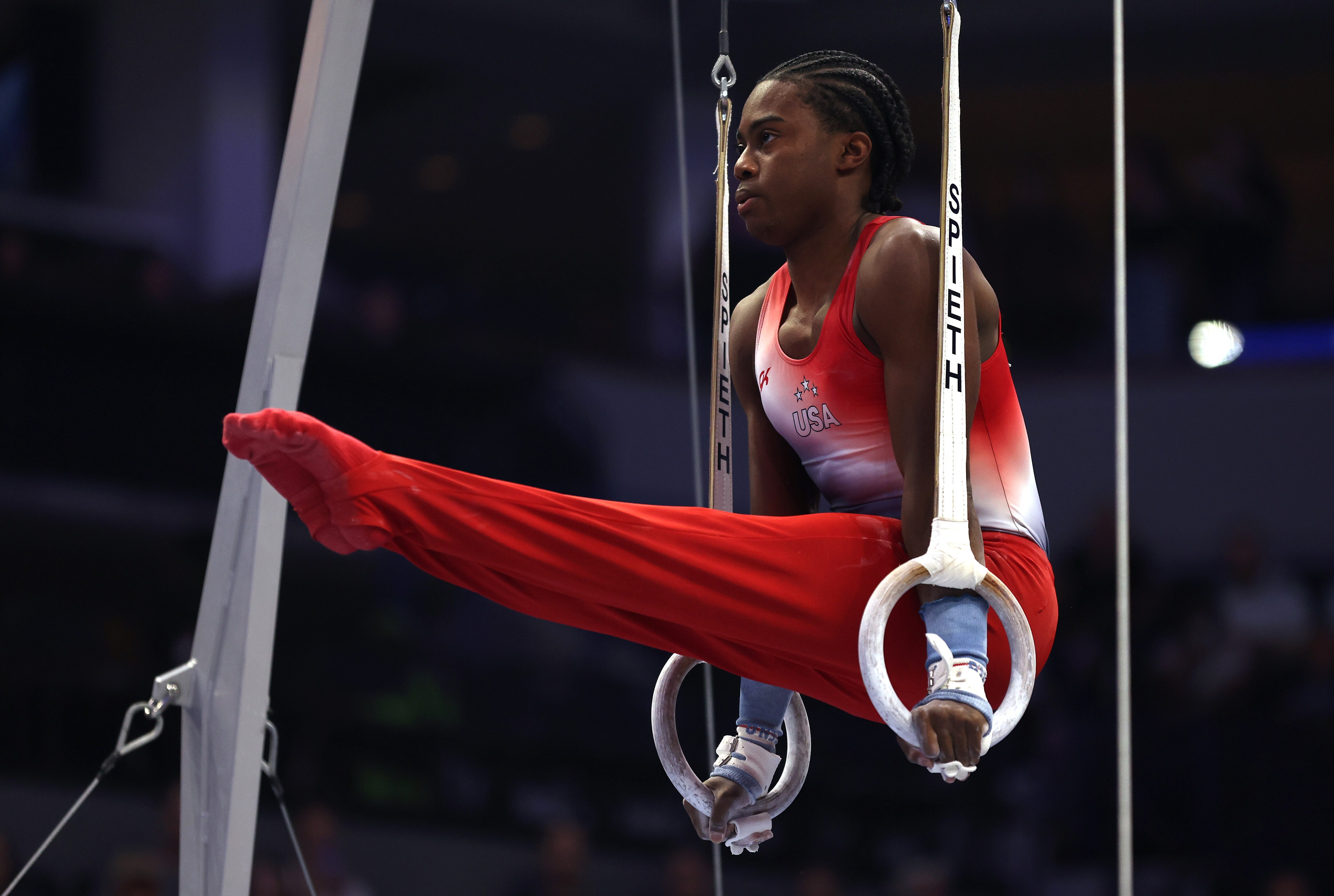 Khoi Young of Bowie competes on the rings Thursday night in Minneapolis. Young put together a brilliant vault but otherwise struggled. He came off the horse — perhaps his best event — and was ninth or worse on five of the six events.
