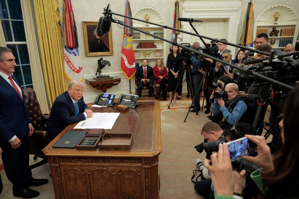U.S. President Donald Trump speaks to reporters after signing Interior Secretary Doug Burghum's commission in the Oval Office on January 31, 2025 in Washington, DC. Trump spoke to reporters about tariffs against China, Canada and Mexico and how Burghum will coordinate with the Energy Department and the Environmental Protection Agency. (Photo by Chip Somodevilla/Getty Images)