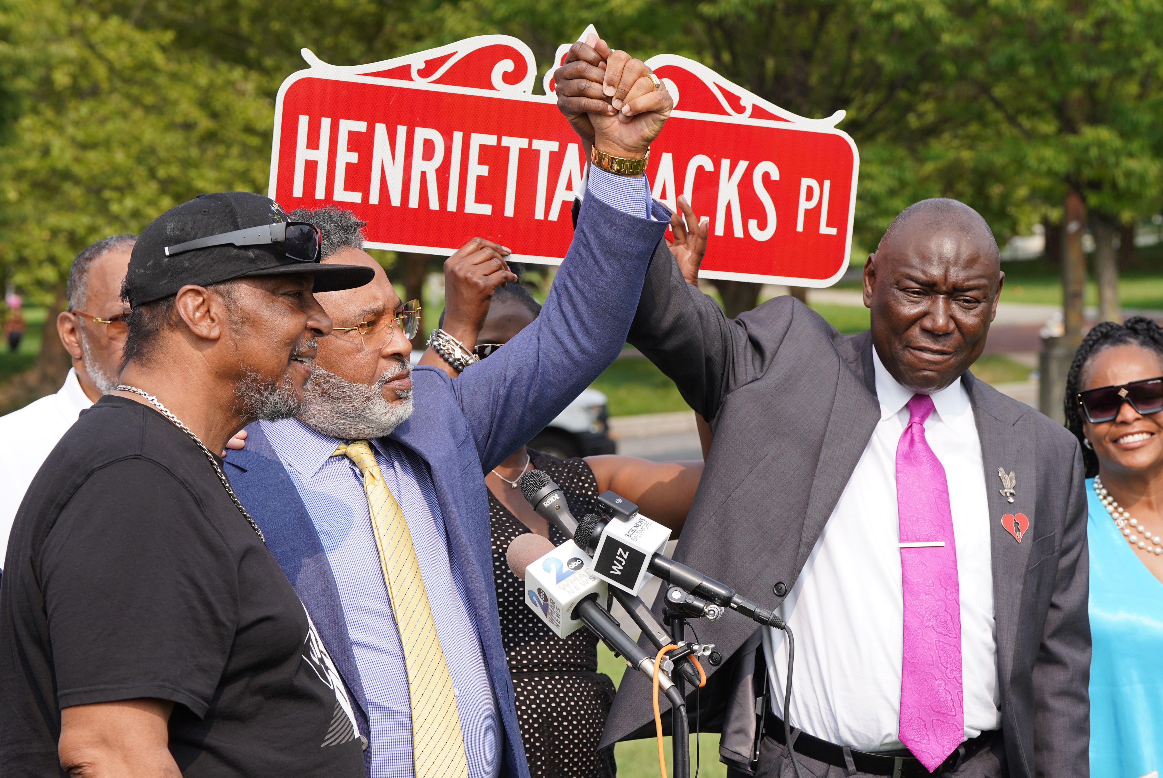 Henrietta Lacks’ living relatives reached a settlement with the biotechnology company they sued seeking compensation for its use of cells that were taken from her decades ago without her consent. From left, Ron Lacks, Alfred Carter and attorney Ben Crump.