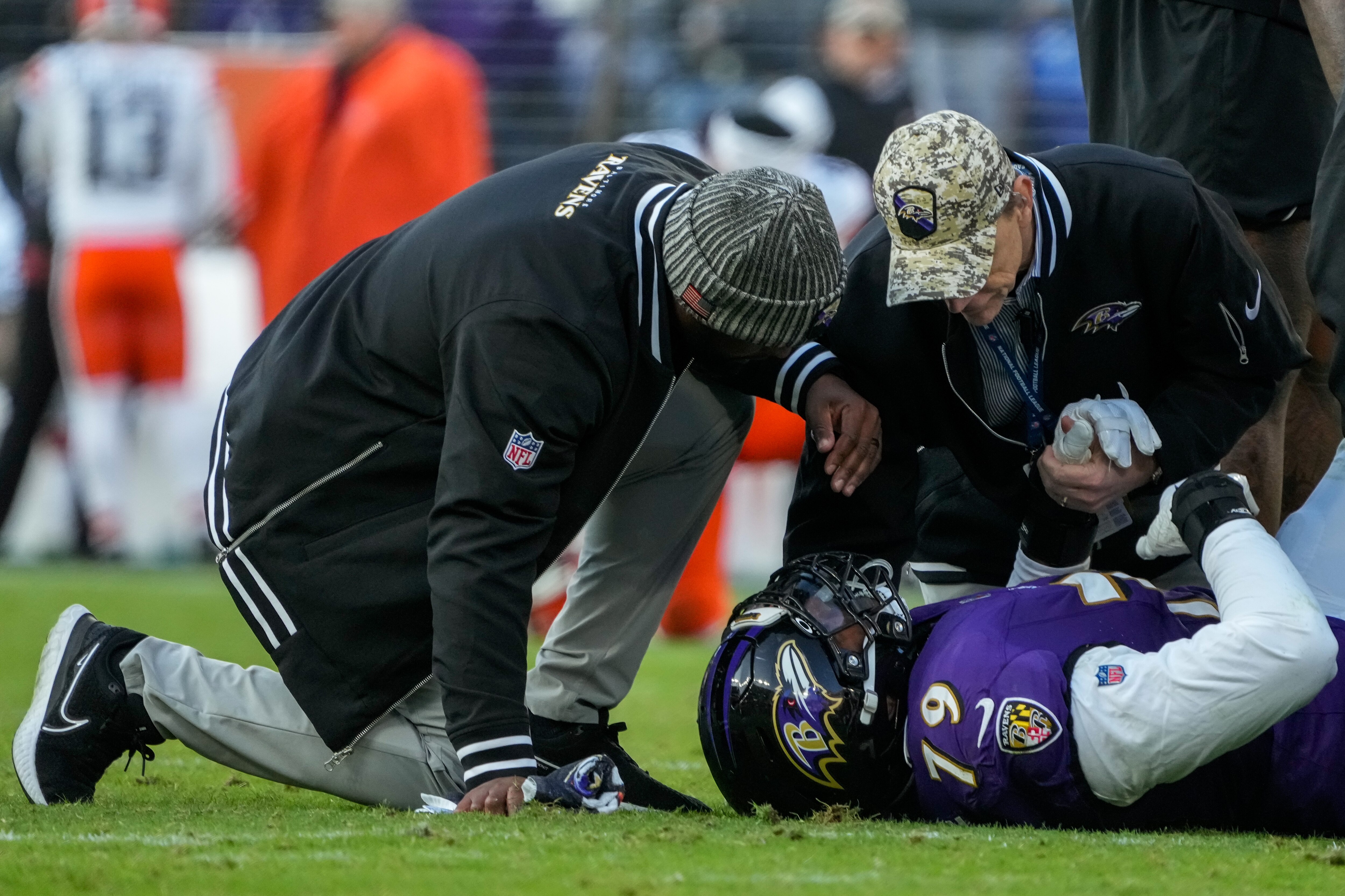 Ravens trainers attend to offensive tackle Ronnie Stanley during a game in November. Stanley's price, age and injury history could make him expendable.