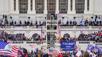 FILE - Insurrectionists loyal to President Donald Trump breach the Capitol in Washington, Jan. 6, 2021. A North Carolina man pleaded guilty on Thursday, Oct. 6, 2022, to plotting with other members of the far-right Proud Boys to violently stop the transfer of presidential power after the 2020 election, making him the first member of the extremist group to plead guilty to a seditious conspiracy charge. Jeremy Joseph Bertino, 43, has agreed to cooperate with the Justice Department's investigation of the role that Proud Boys leaders played in the mob's attack on the U.S.