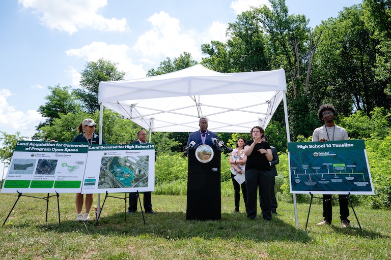 County Executive Calvin Ball speaks at a press conference as officials announced they’d secured the site at Troy Park in Elkridge.