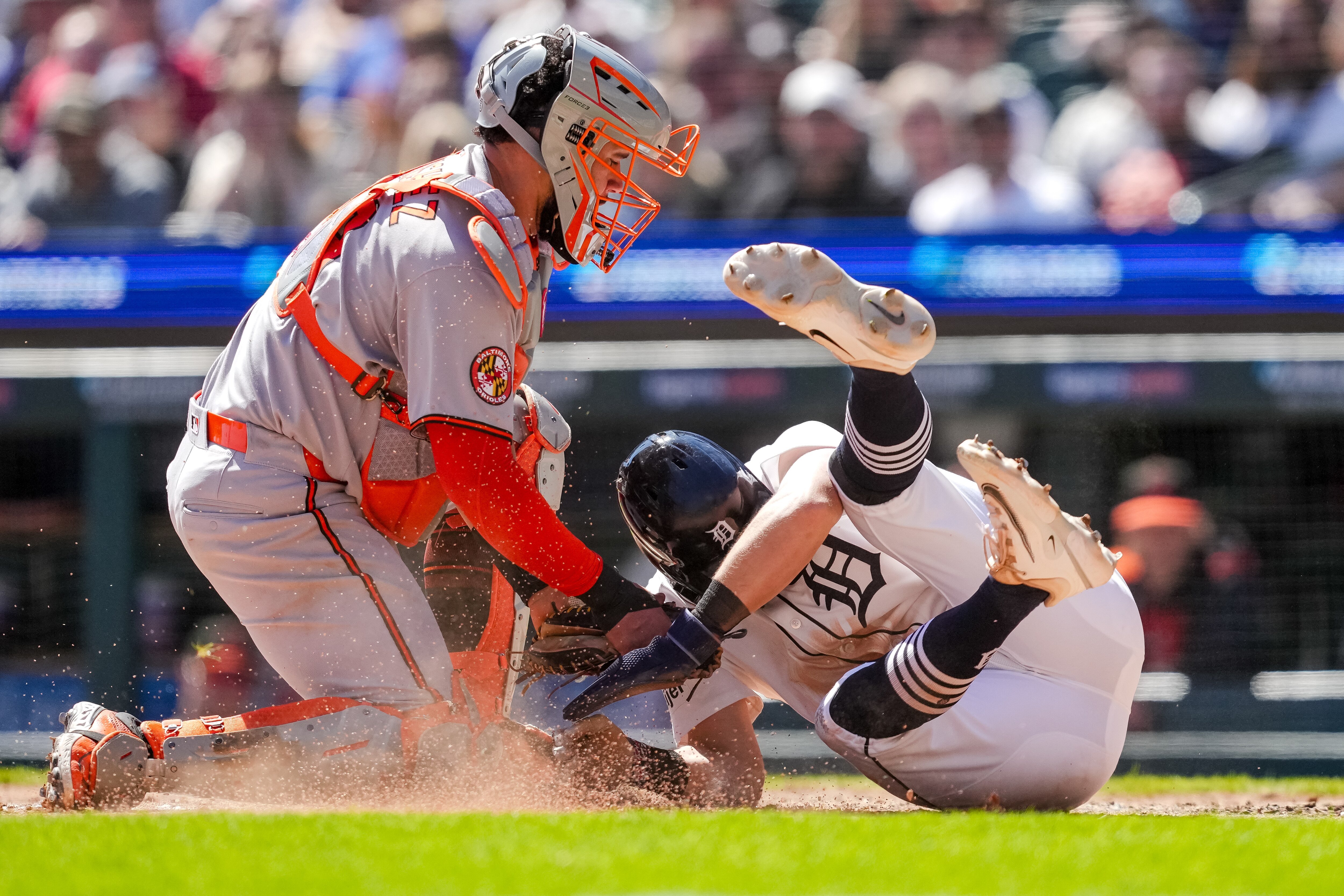 Orioles catcher Gary Sánchez tags out Trey Sweeney of the Tigers in the sixth inning Sunday during Detroit’s 7-0 win.
