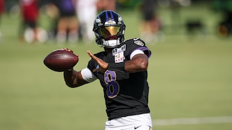 OWINGS MILLS, MD - AUGUST 26: Lamar Jackson #8 of the Baltimore Ravens attempts a pass during the Washington Commanders and Baltimore Ravens joint practice at Under Armour Performance Center Baltimore Ravens on August 26, 2026 in Owings Mills, Maryland. (Photo by Scott Taetsch/Getty Images)