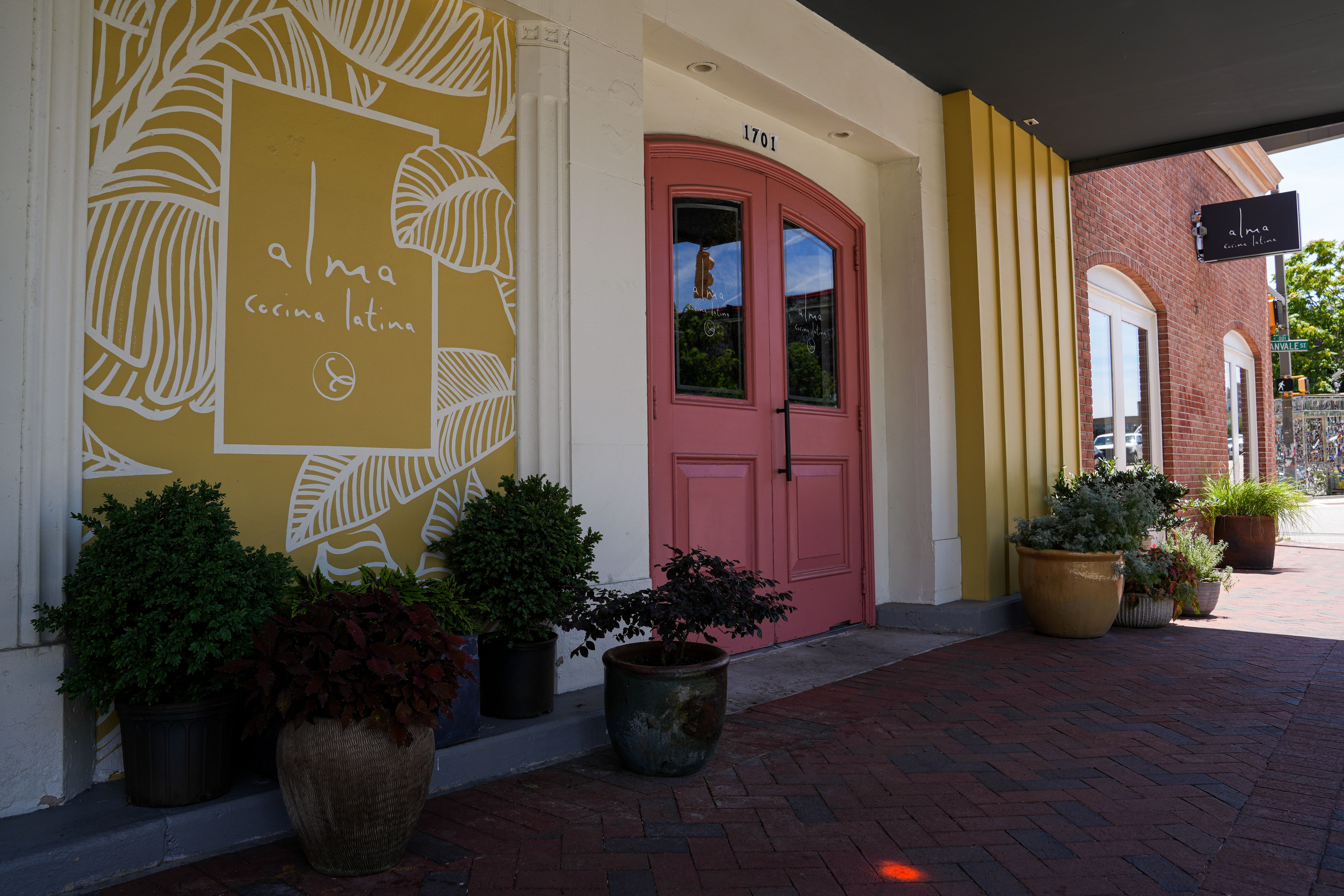 The former executive chef of Alma Cocina Latina is suing the restaurant owners.