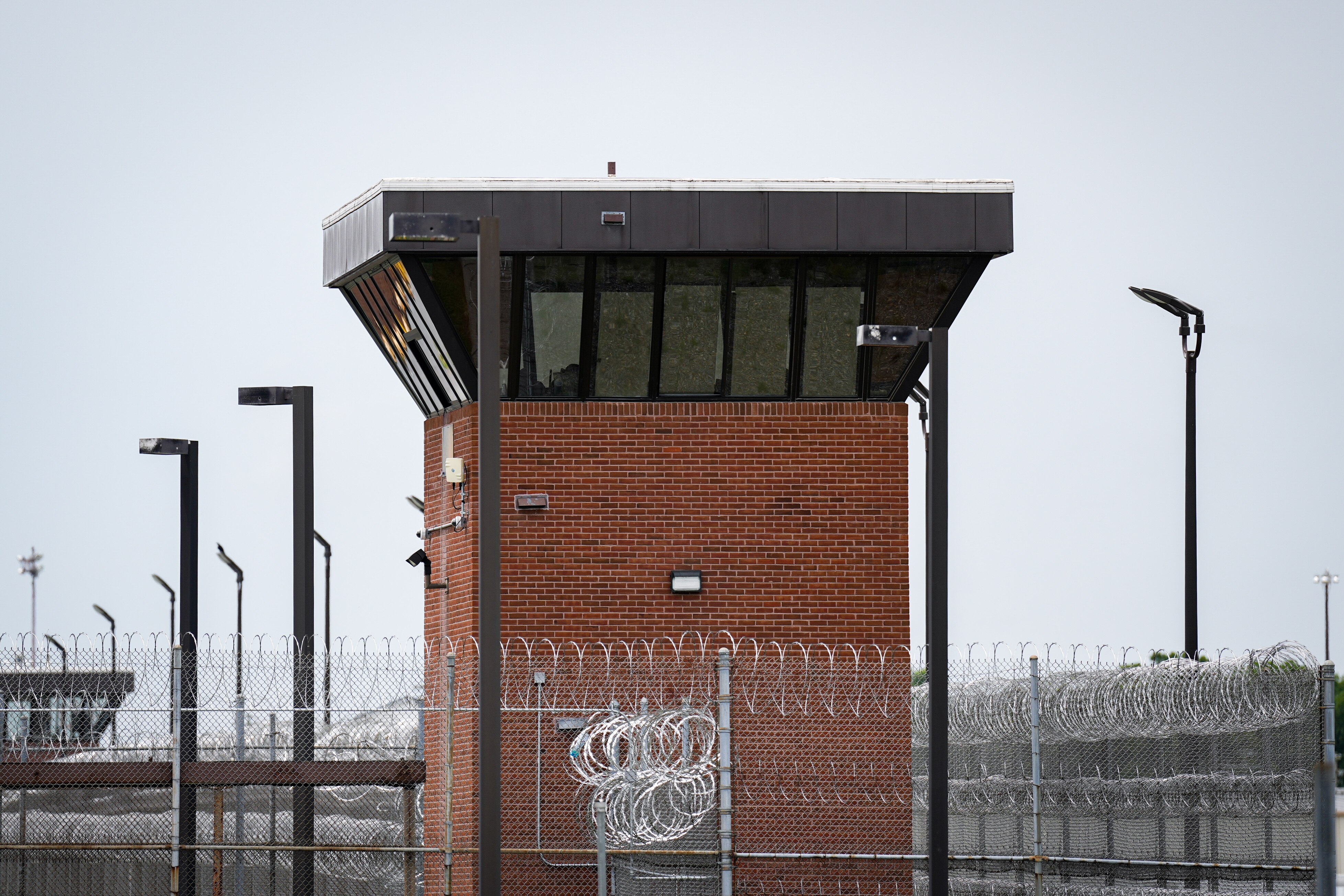 A guard tower and barbed wire are seen outside the Maryland Correctional Institution in Hagerstown on Wednesday, August 7, 2024.