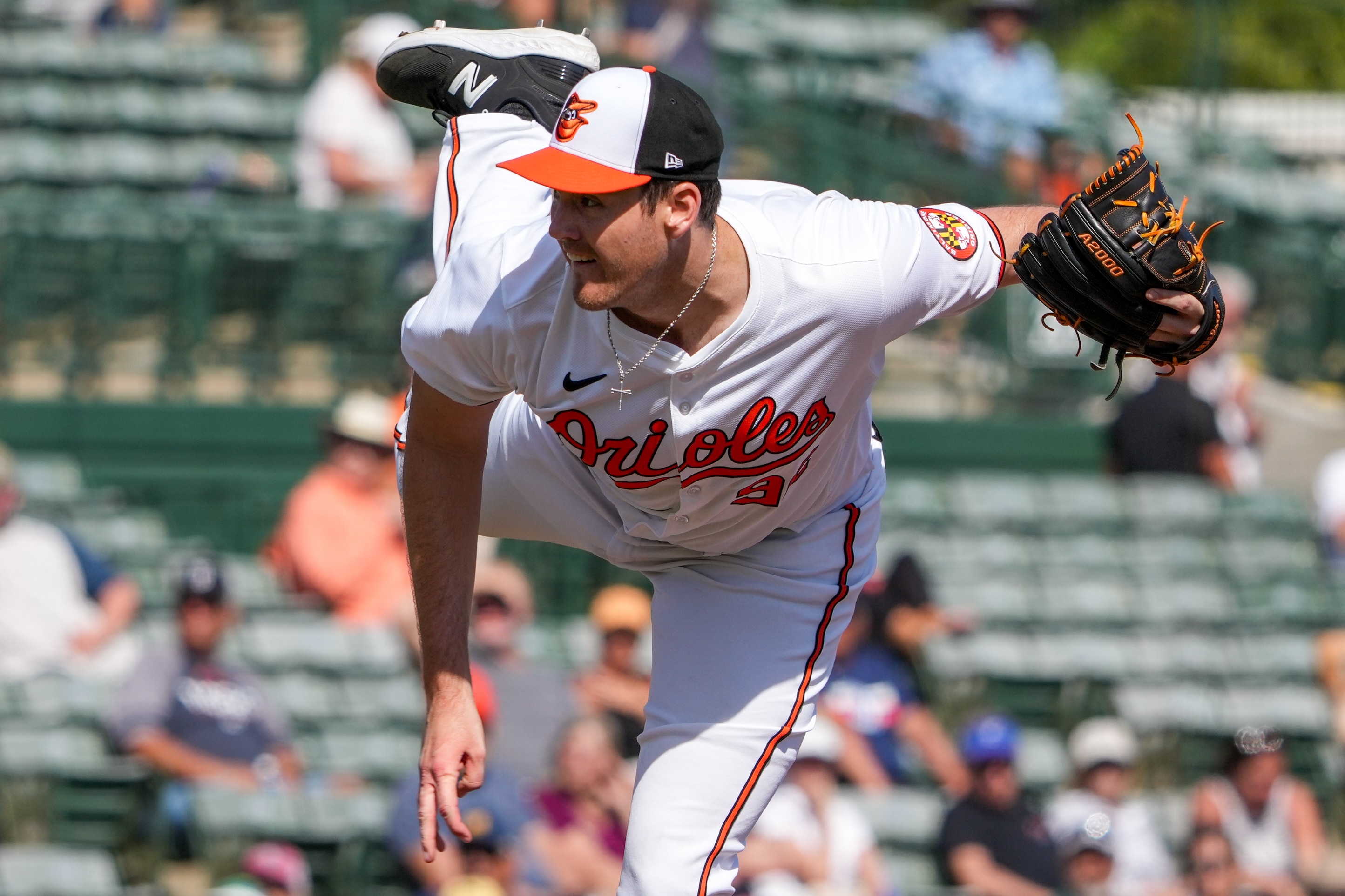 Baltimore Orioles relief pitcher Keagan Gillies (96) delivers a pitch against the Detroit Tigers during a Grapefruit League game.