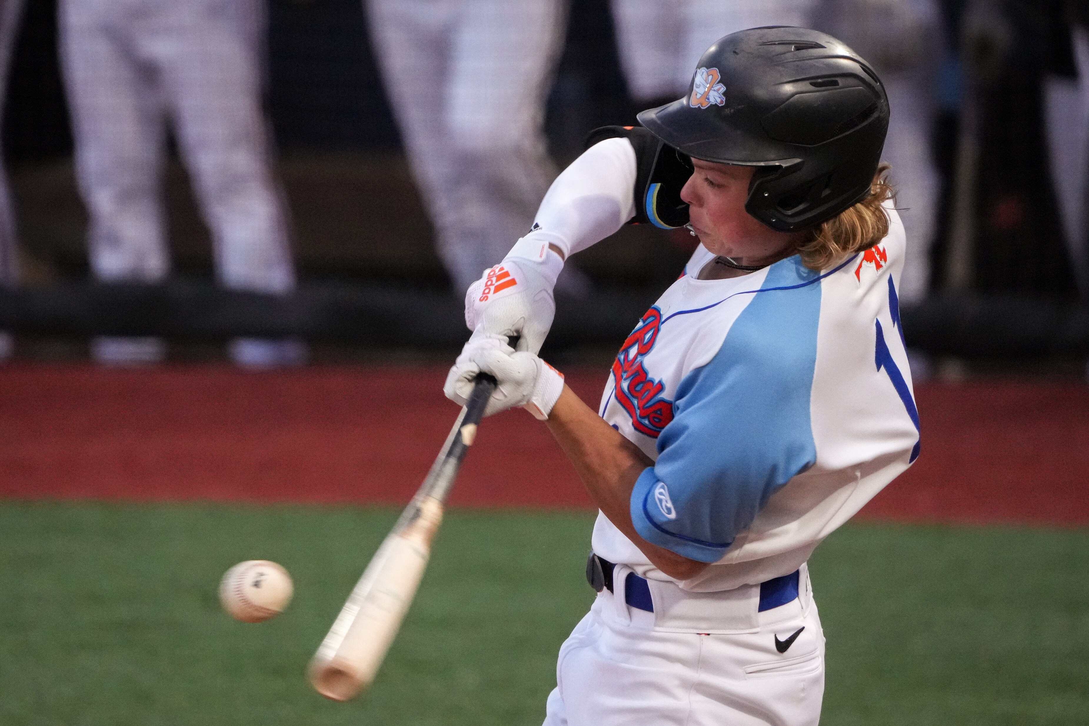 Aberdeen IronBirds shortstop Jackson Holliday (11) hits a ground ball and makes it to first base in a game against the Hudson Valley Renegades at Leidos Field at Ripken Stadium on Tuesday, May 9. This game against the Renegades was Holliday’s home debut for the IronBirds.
