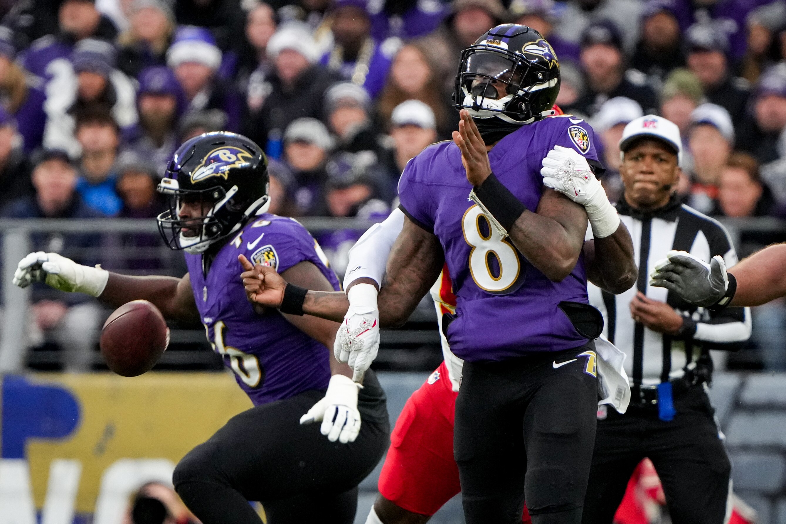 Chiefs defensive end Charles Omenihu forces Lamar Jackson to fumble in the second quarter of the AFC championship game Sunday.