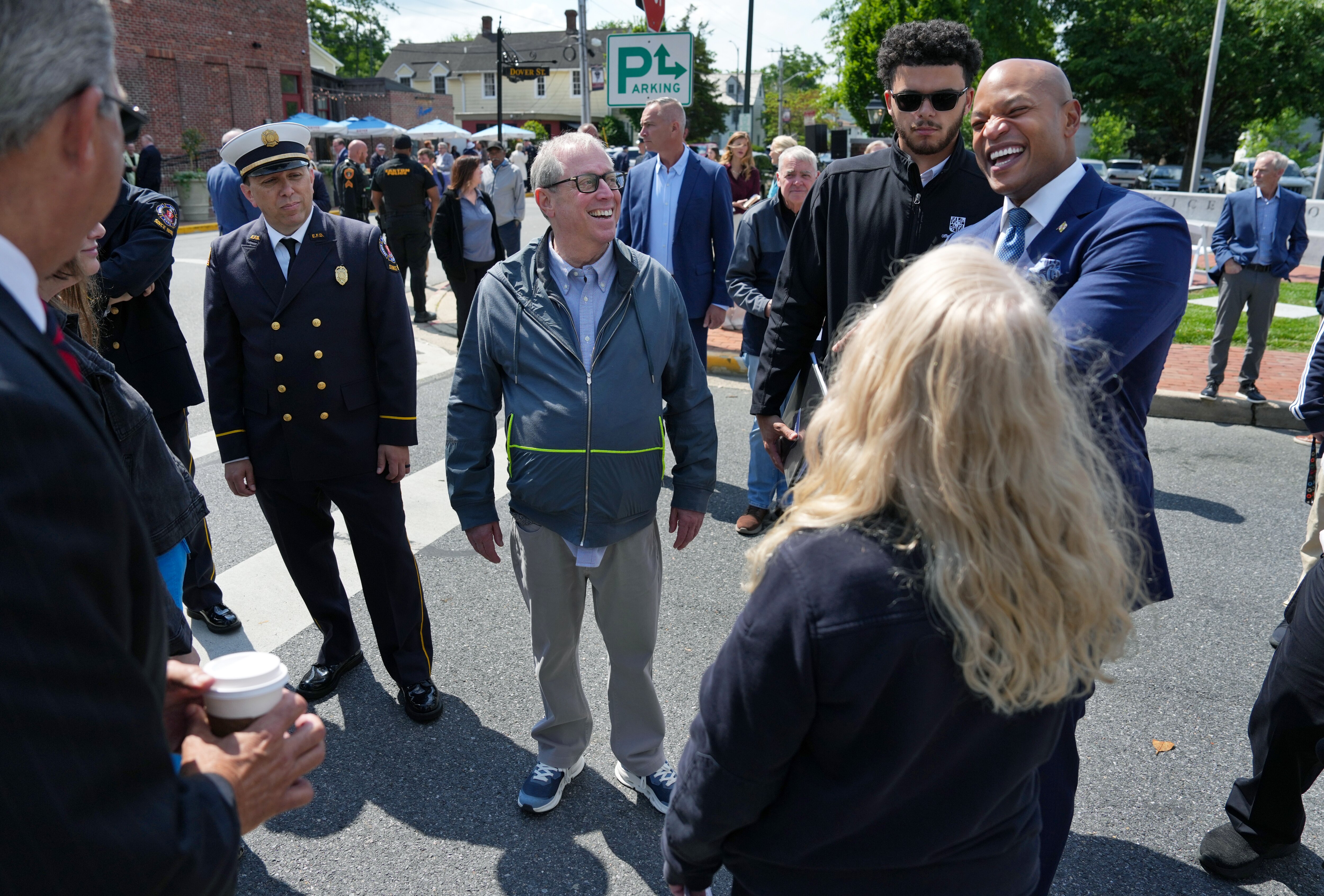 TeraWulf CEO Paul Prager shares a joke with Gov. Wes Moore as more greets attendees after delivering the keynote speech during the 6th Annual First Responder’s Celebration in downtown Easton, MD, U.S.