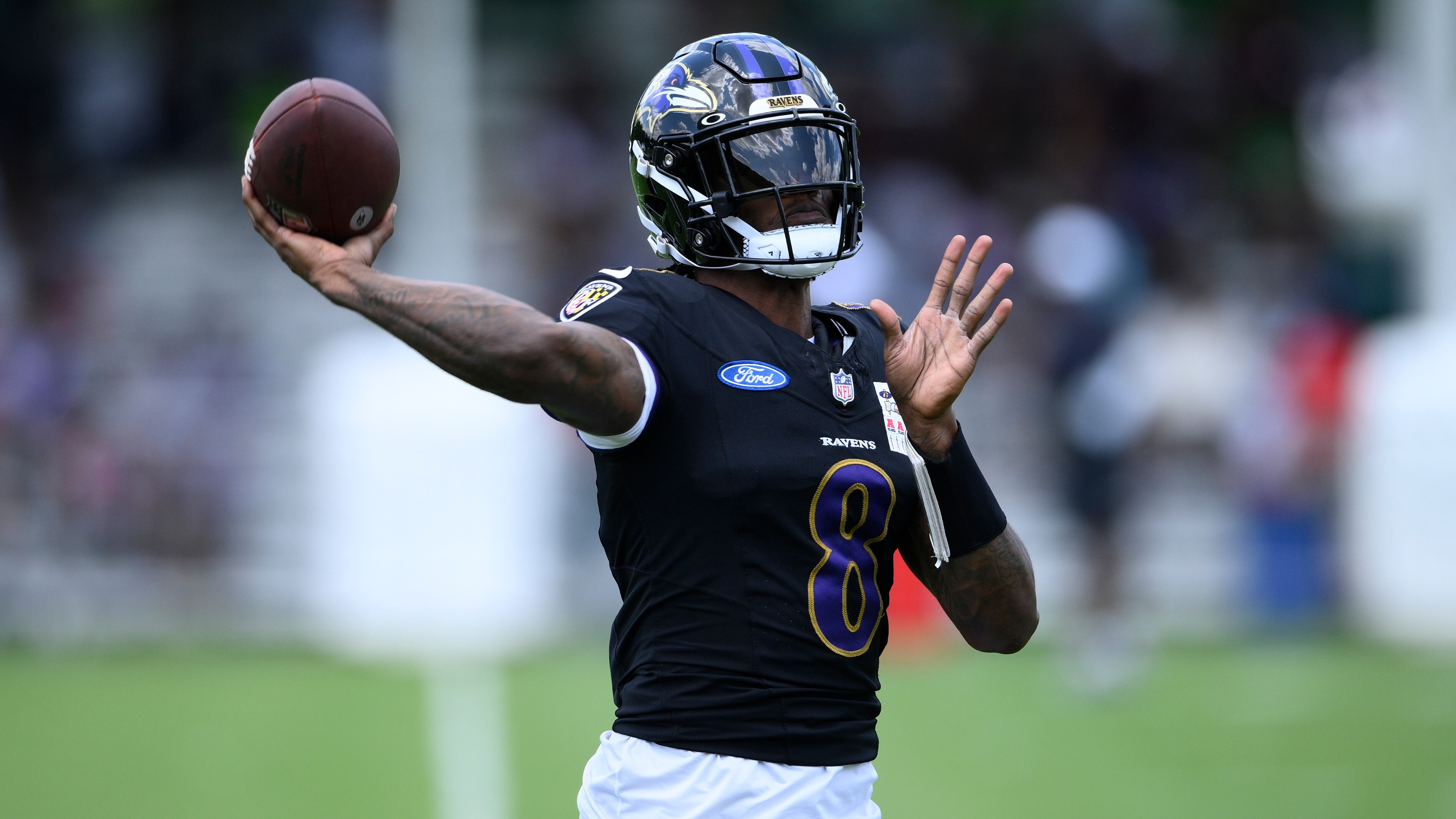 Baltimore Ravens quarterback Lamar Jackson works out during NFL football training camp, Saturday, July 27, 2024, in Owings Mills, Md. (AP Photo/Nick Wass)