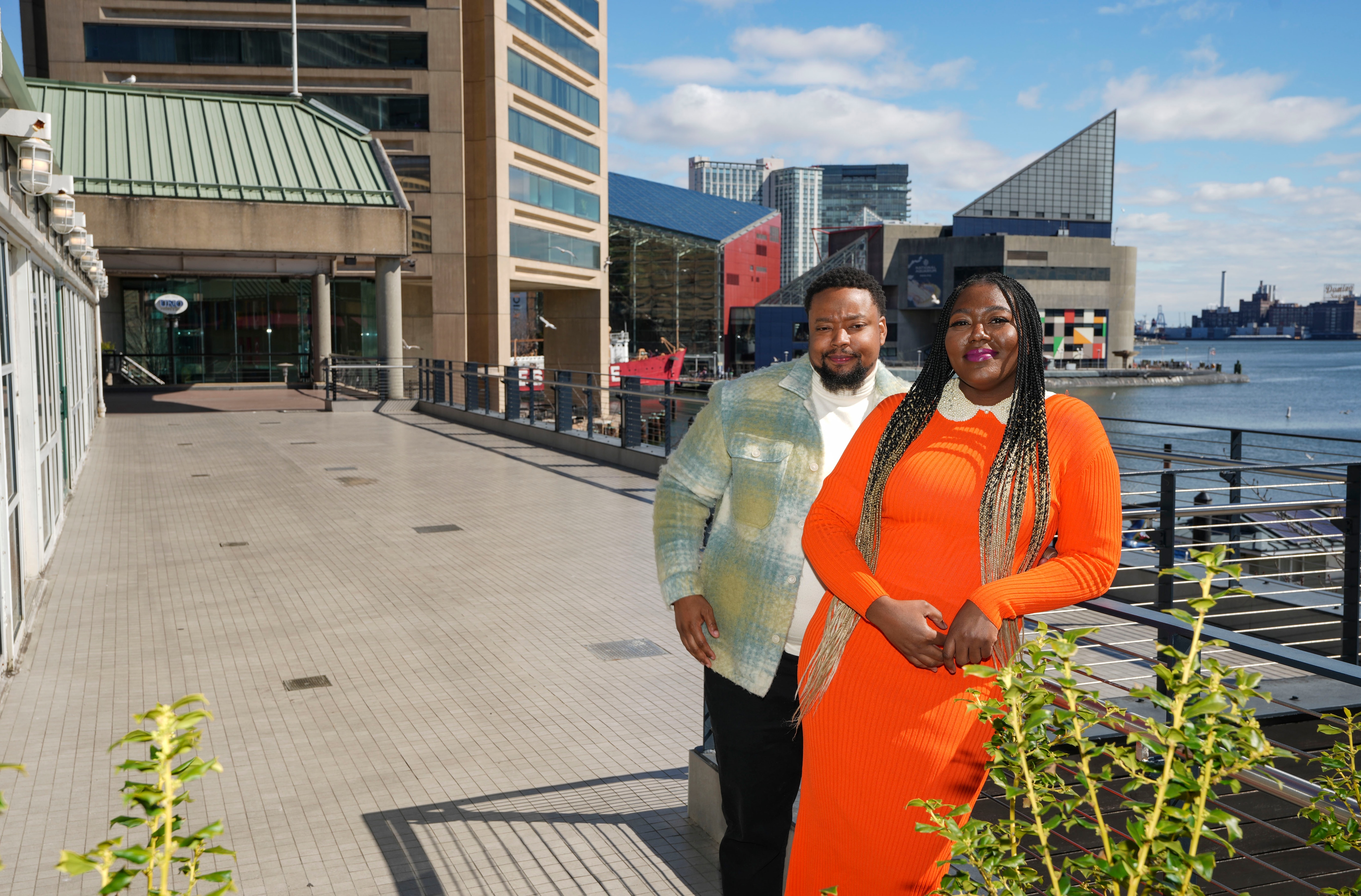 Crust by Mack owner Amanda Mack and her partner Jarrod Mack stand outside the eatery’s Harborplace retail space in March 2023. It closed Nov. 1.