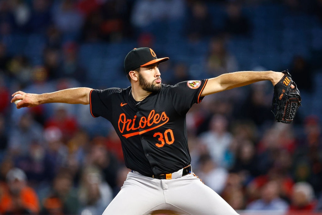 ANAHEIM, CALIFORNIA - APRIL 23:  Grayson Rodriguez #30 of the Baltimore Orioles throws against the Los Angeles Angels in the fourth inning at Angel Stadium of Anaheim on April 23, 2024 in Anaheim, California. (Photo by Ronald Martinez/Getty Images)