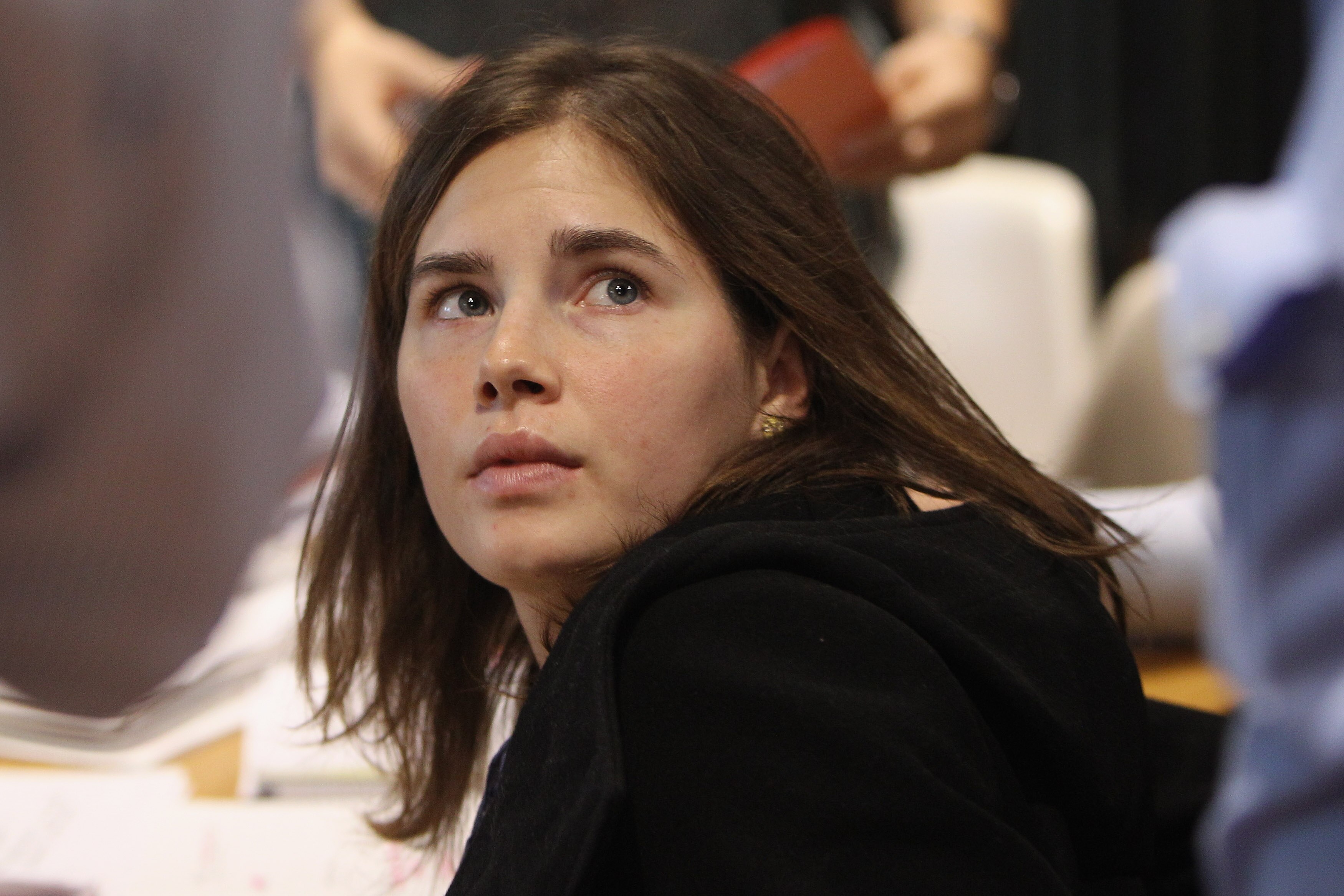 In this photo from Sept. 30, 2011, Amanda Knox, an American exchange student who was convicted and imprisoned, and ultimately acquitted, in the killing and sexual assault of her British roommate Meredith Kercher, attends an appeal hearing at the Court of Appeal in Perugia, Italy. Knox is one of more than 70 people who were wrongfully convicted of crimes that signed onto a legal brief on Monday in the Maryland Supreme Court in support of Adnan Syed.