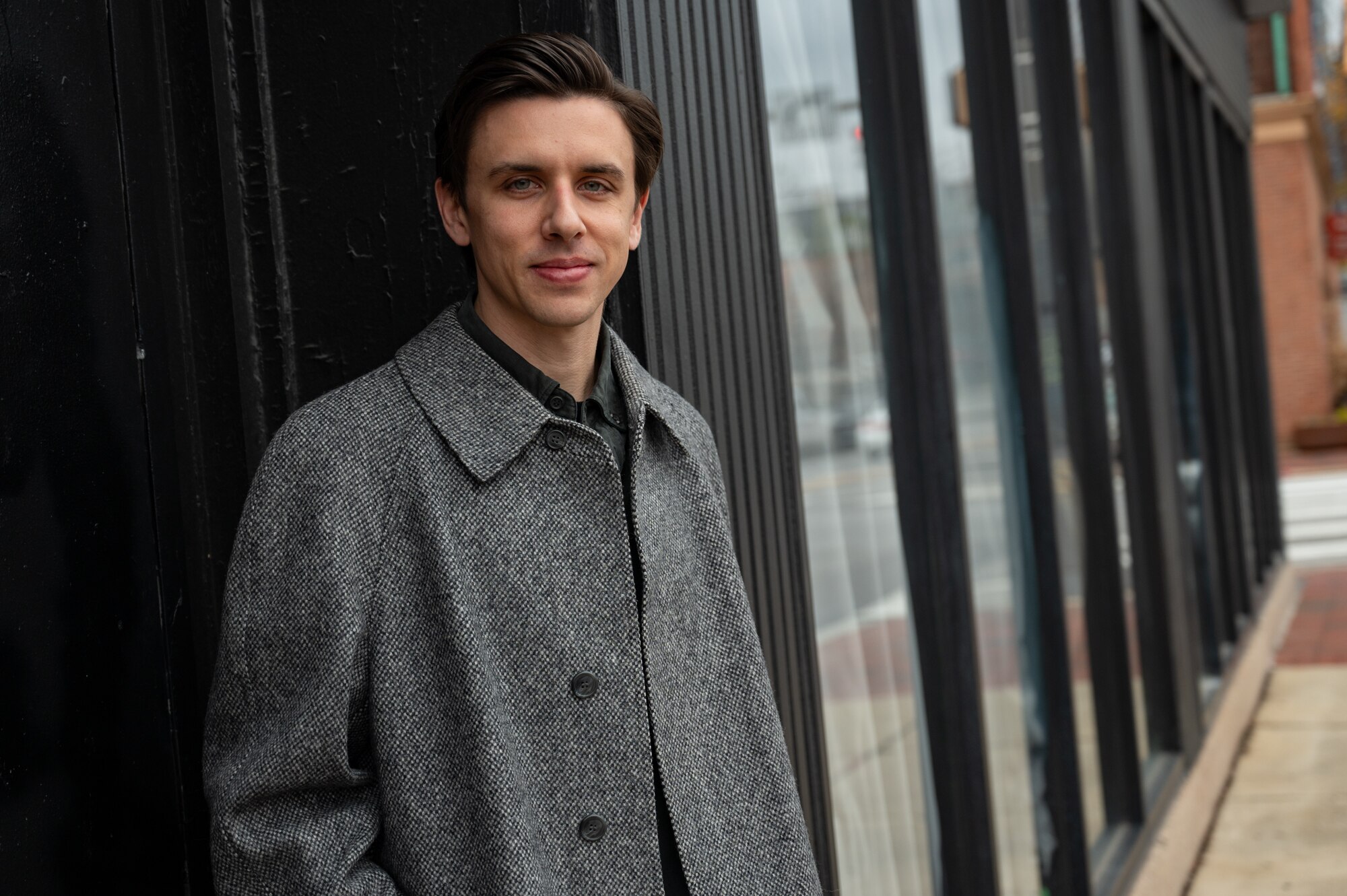 Chris Uhl poses outside of Metro Gallery on Dec. 28, 2023. He quit drinking a year and said, “Cutting alcohol out of my life was one of the best decisions I ever made."