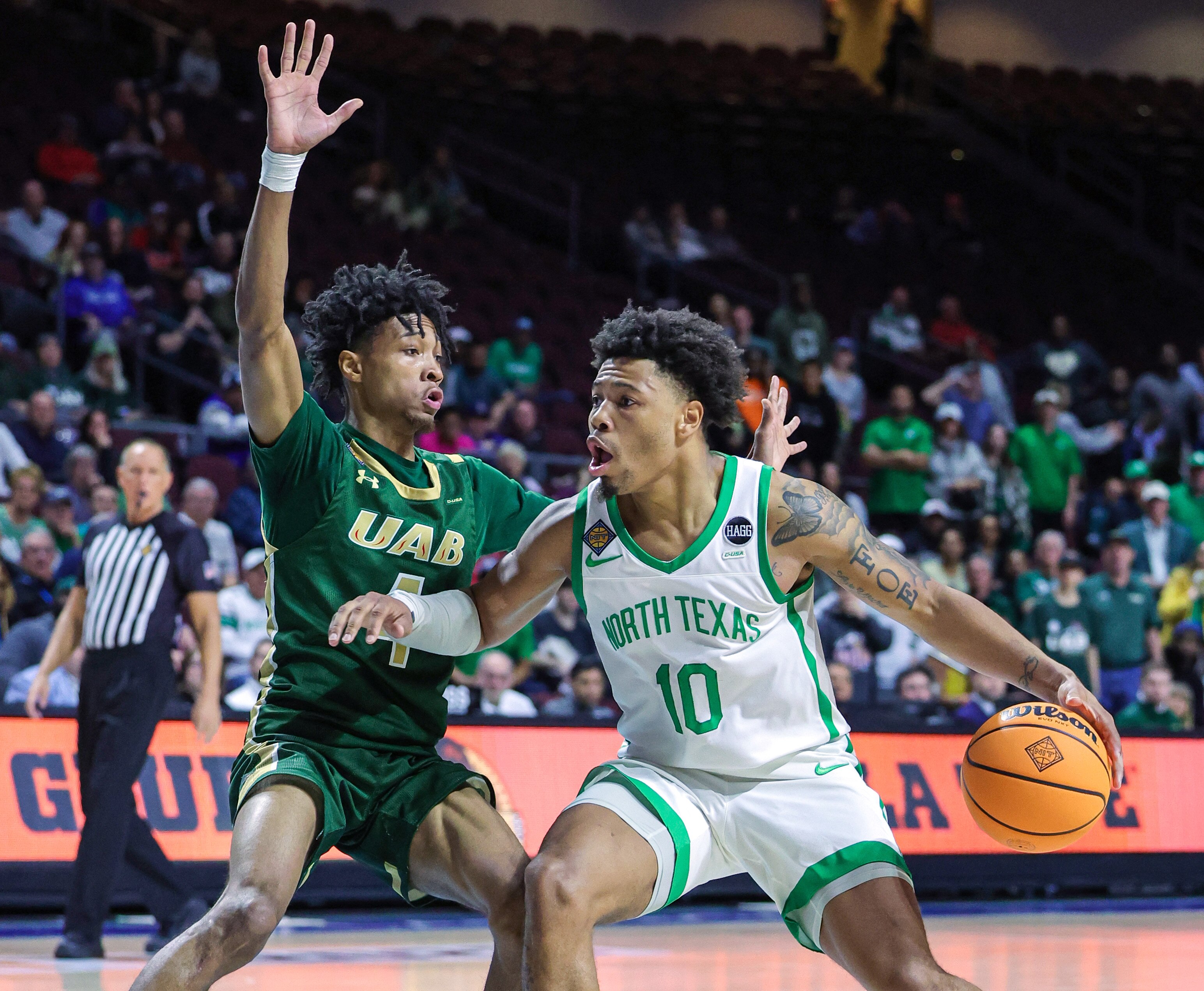 Eric Gaines of UAB, left, pictured against North Texas, scored 20 points Sunday in the Blazers' win over Maryland.